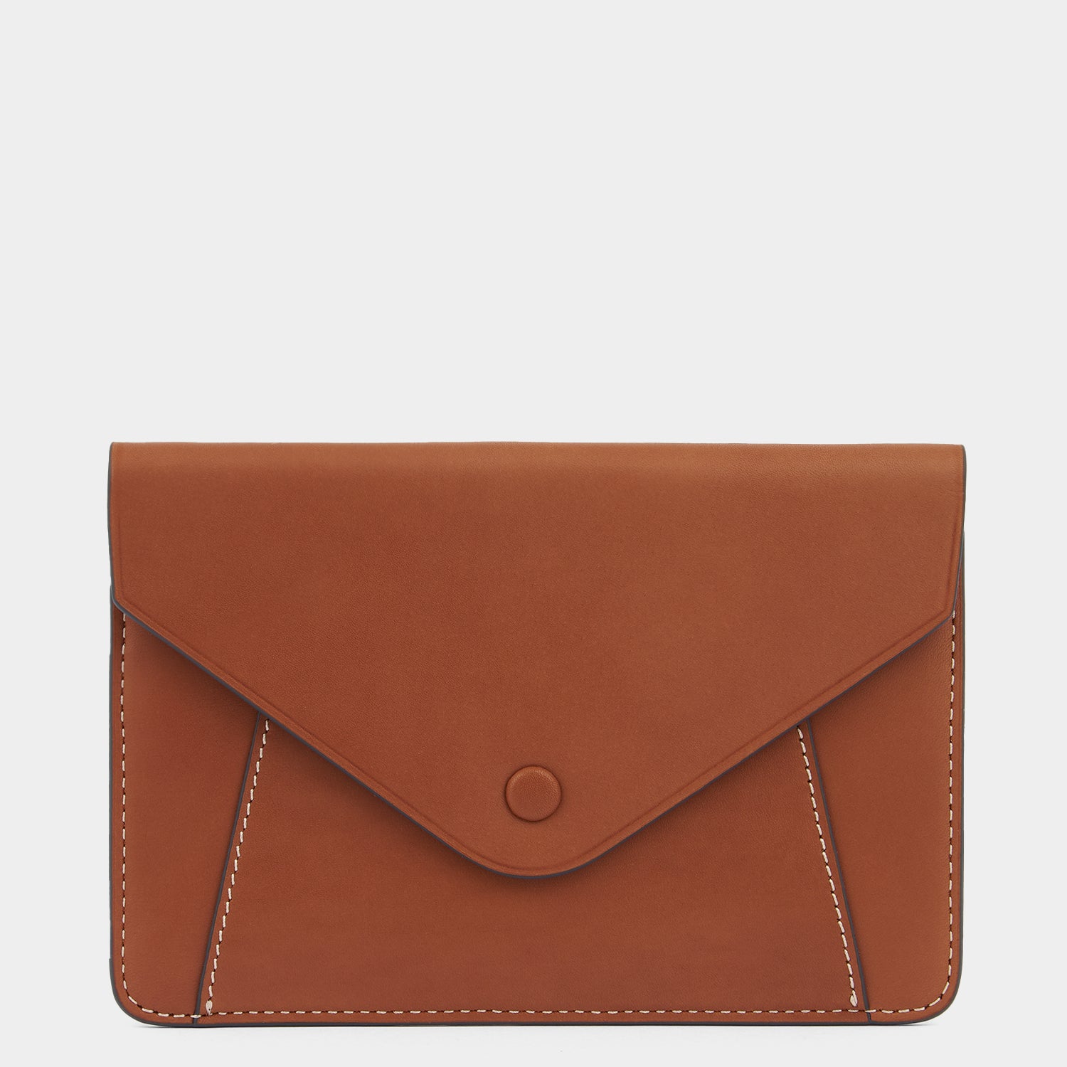 Envelope Passport Holder -

          
            Capra in Tan -
          

          Anya Hindmarch US
