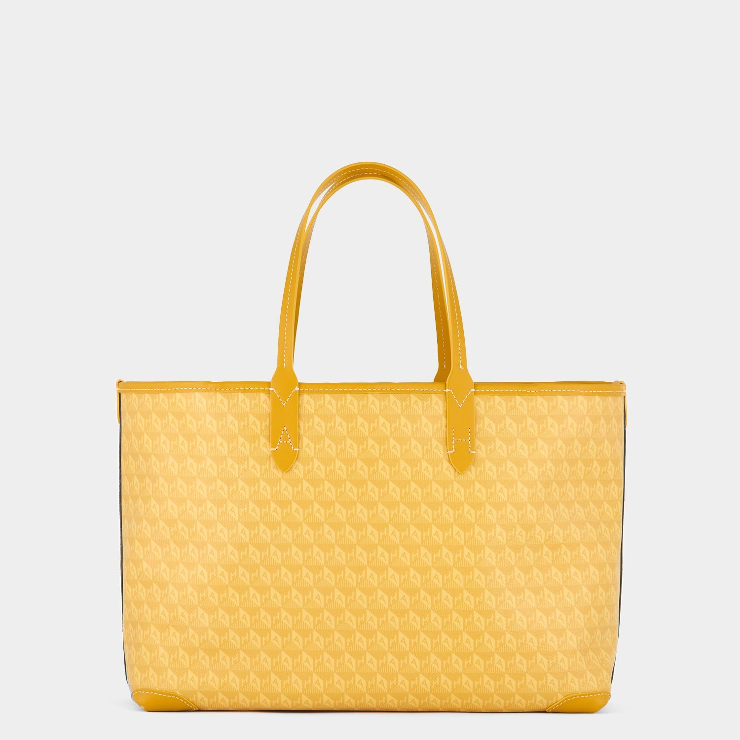 Peanuts I am a Plastic Bag Small Snoopy Tote -

          
            Recycled Canvas in Mustard -
          

          Anya Hindmarch US
