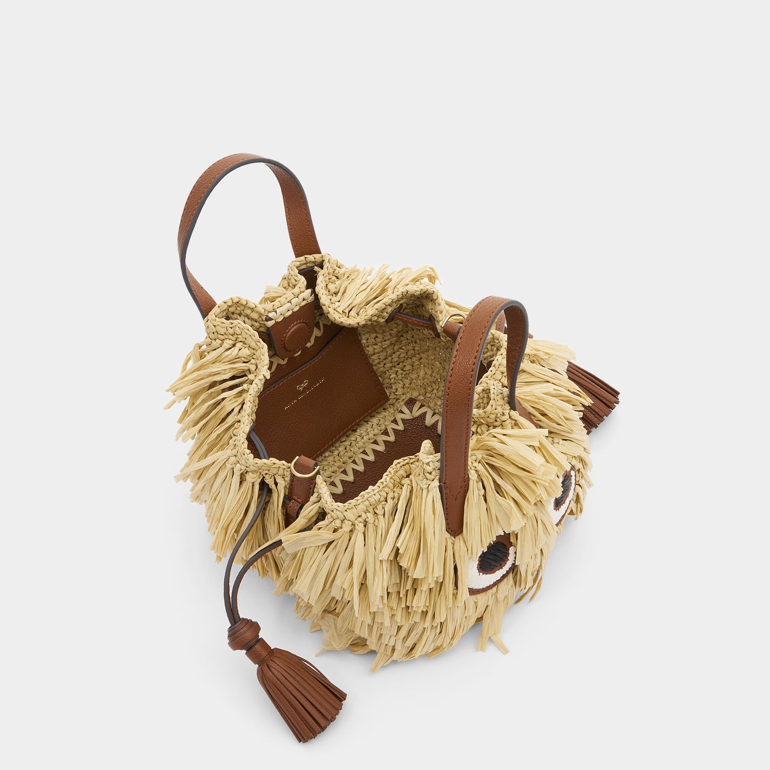 Raffia Eyes Small Drawstring Tote -

          
            Raffia in Natural -
          

          Anya Hindmarch US
