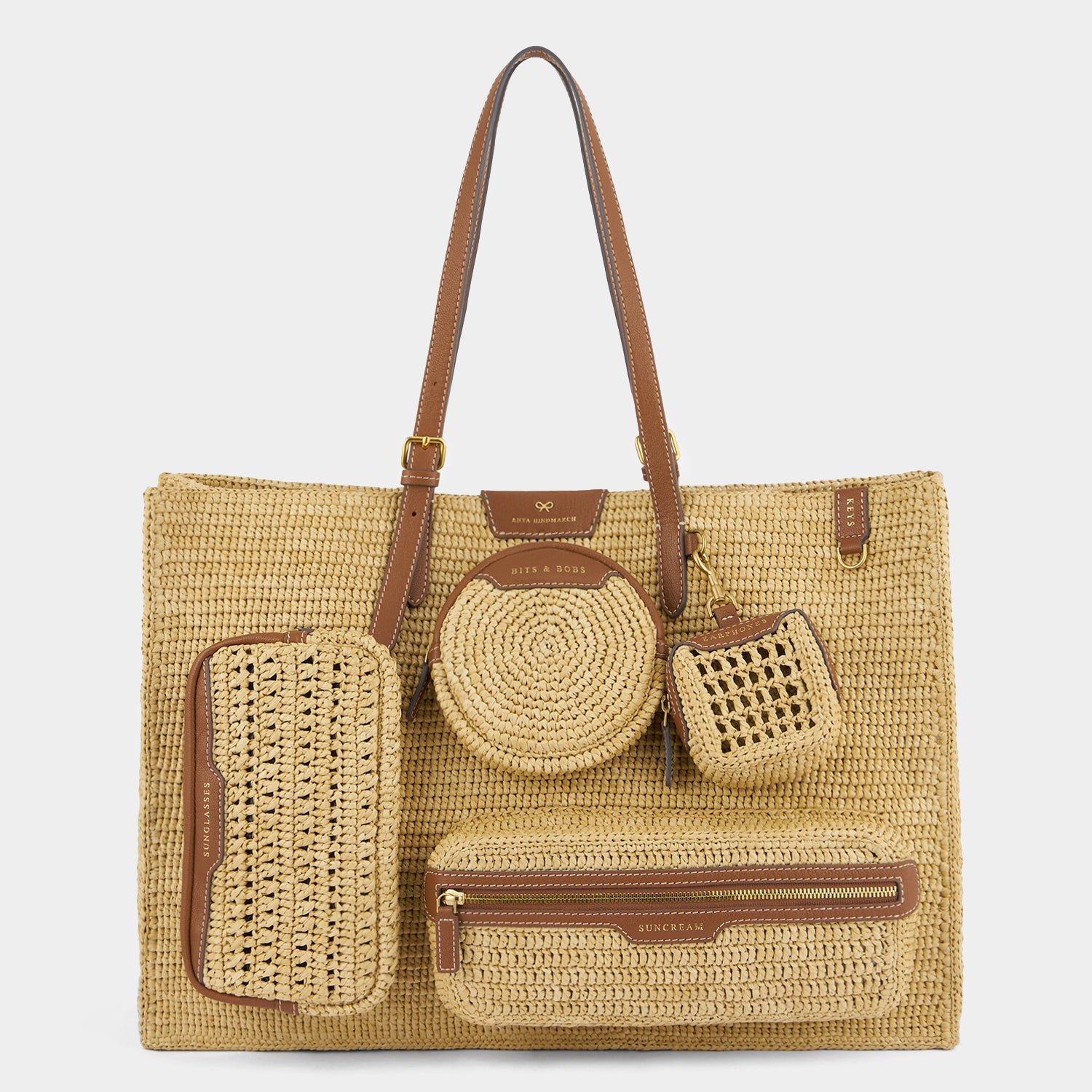 E/W Raffia Holiday Tote -

          
            Raffia in Natural -
          

          Anya Hindmarch US
