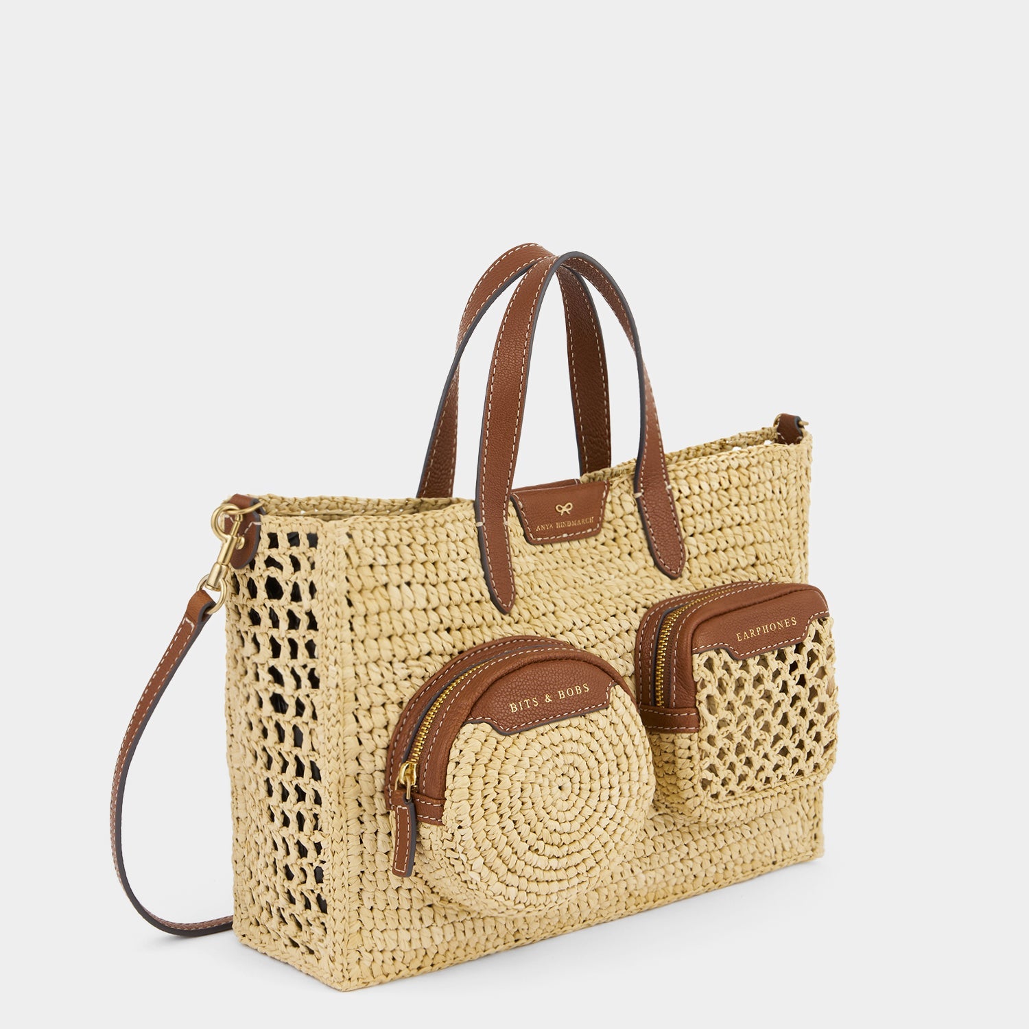 X/S Raffia Holiday Cross-body Tote -

          
            Raffia in Natural -
          

          Anya Hindmarch US
