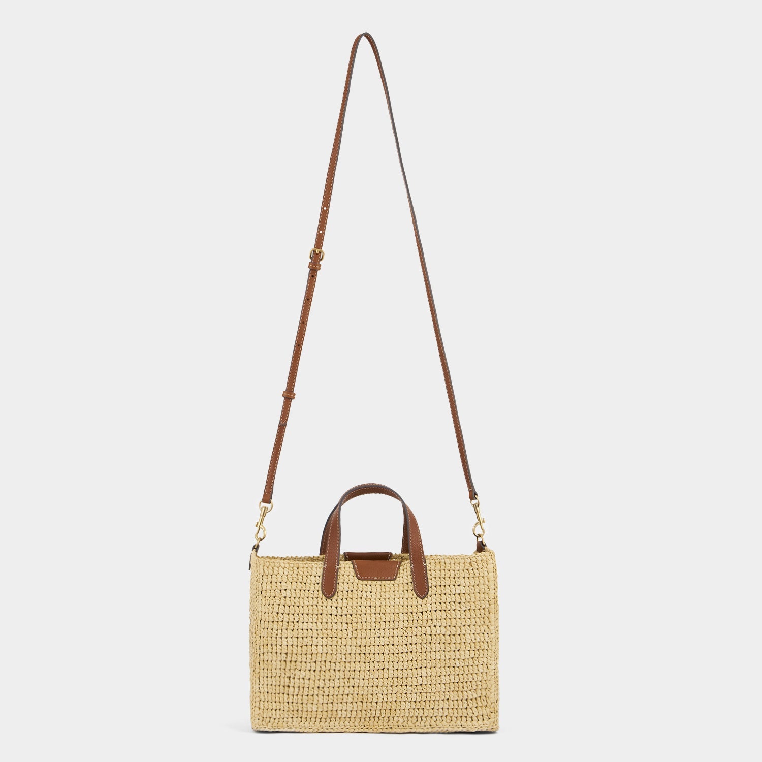 X/S Raffia Holiday Cross-body Tote -

          
            Raffia in Natural -
          

          Anya Hindmarch US
