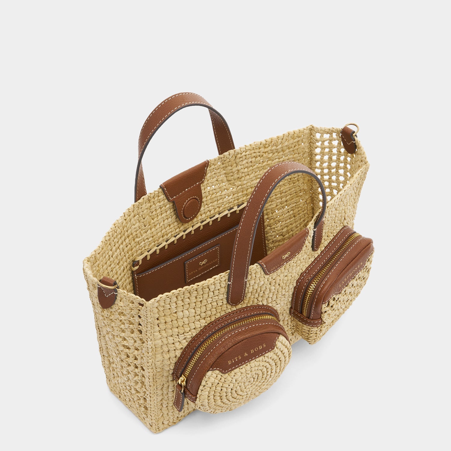 X/S Raffia Holiday Cross-body Tote -

          
            Raffia in Natural -
          

          Anya Hindmarch US
