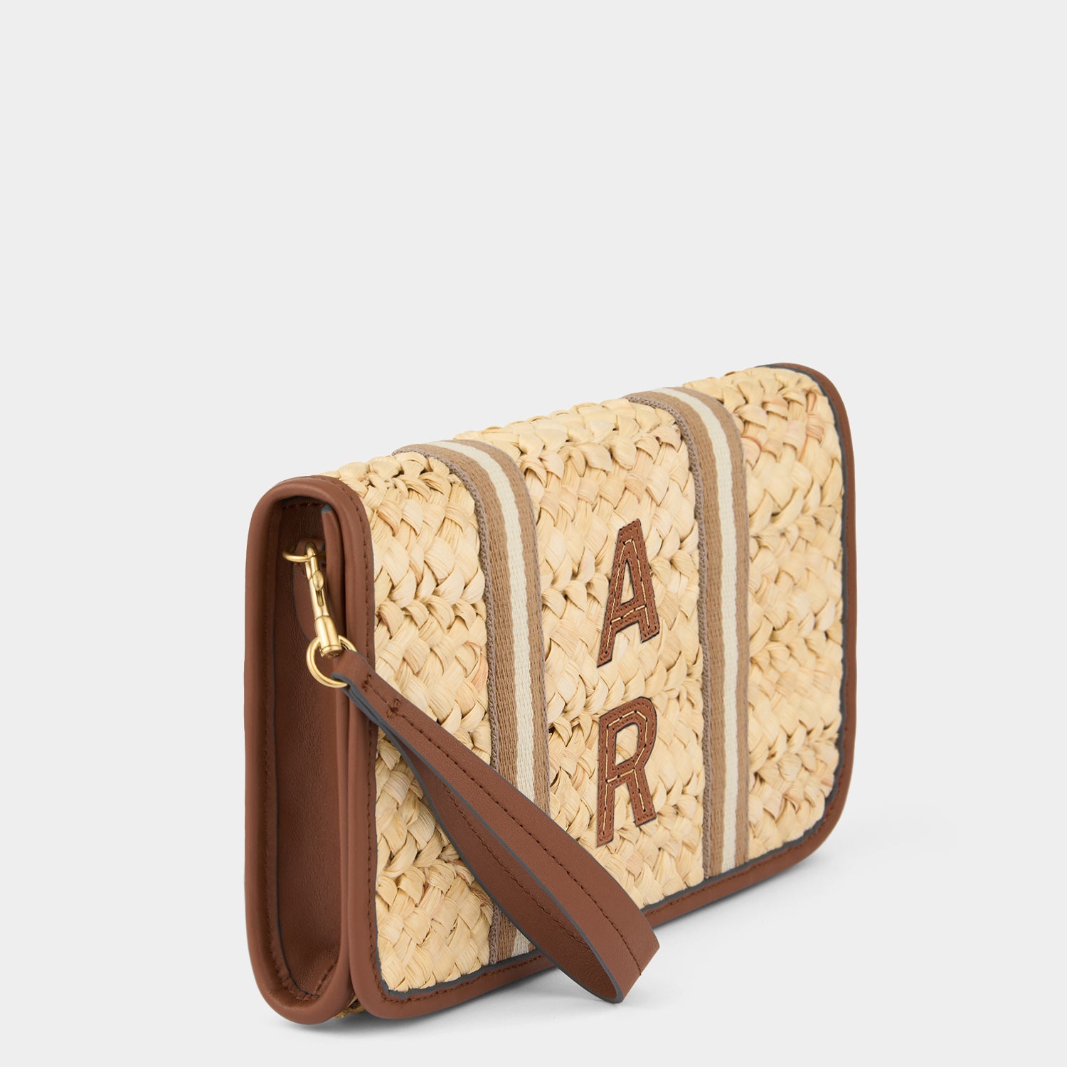 Walton Clutch With Wristlet -

          
            Cornhusk in Natural -
          

          Anya Hindmarch US
