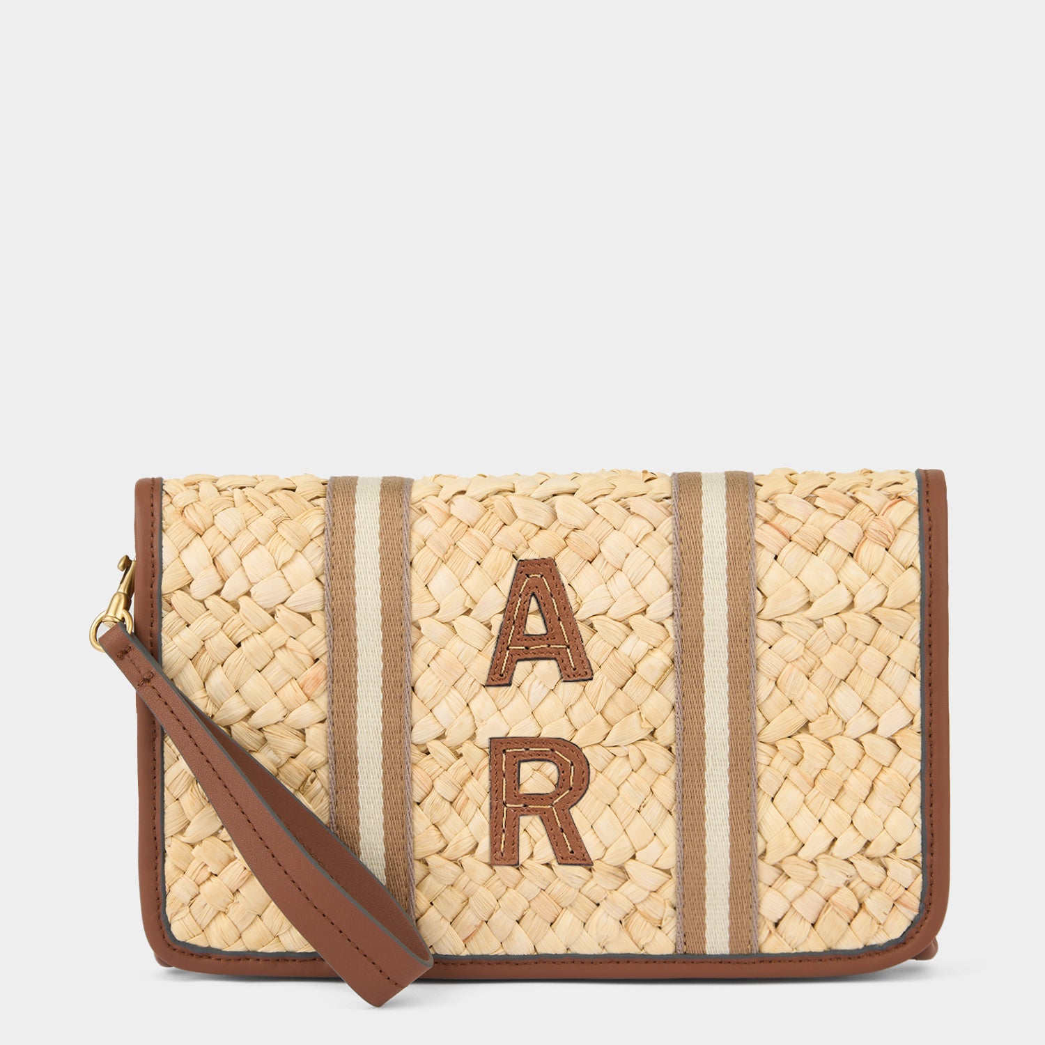 Walton Clutch With Wristlet -

          
            Cornhusk in Natural -
          

          Anya Hindmarch US
