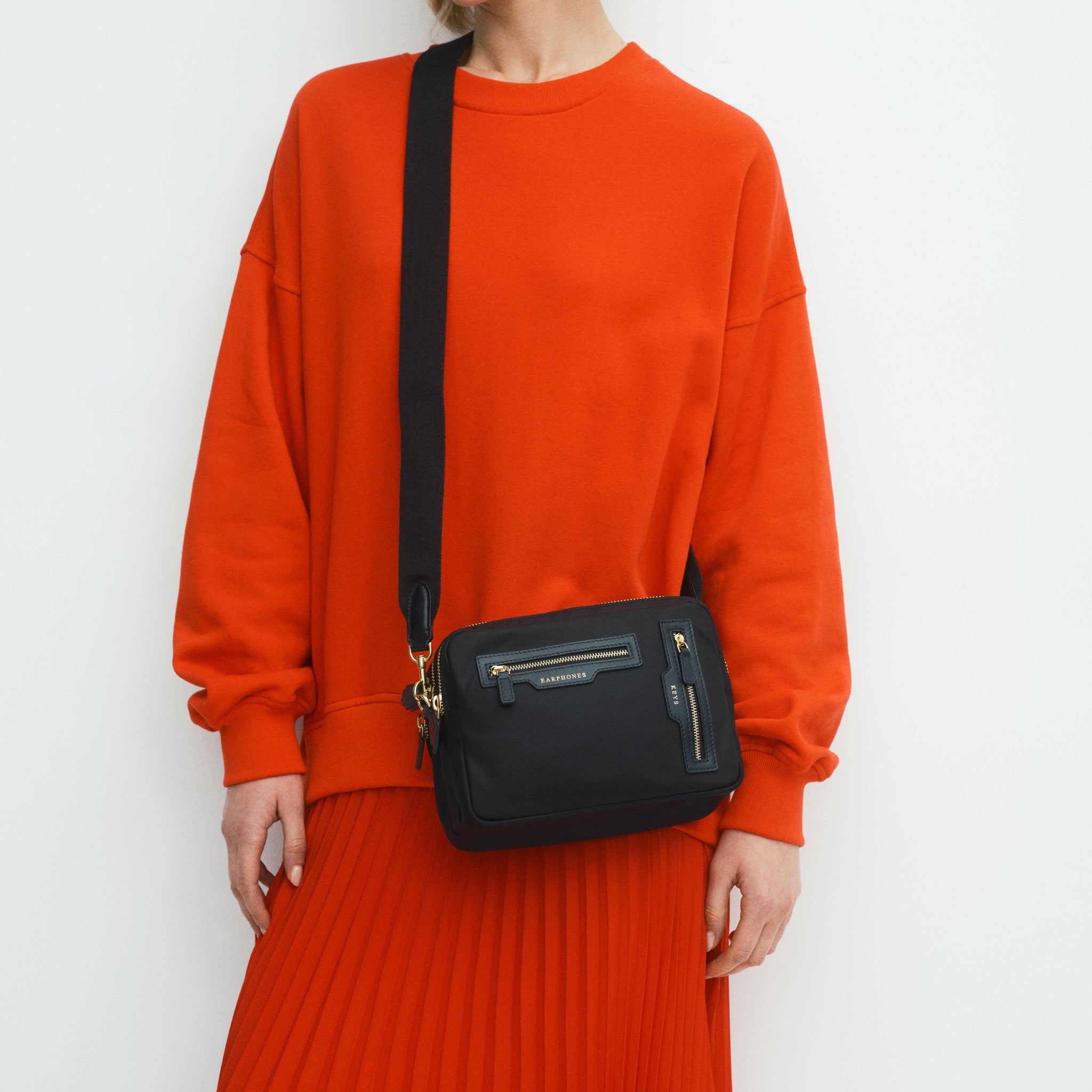 Triple Zip Cross-body -

          
            Regenerated ECONYL® Nylon in Black -
          

          Anya Hindmarch US
