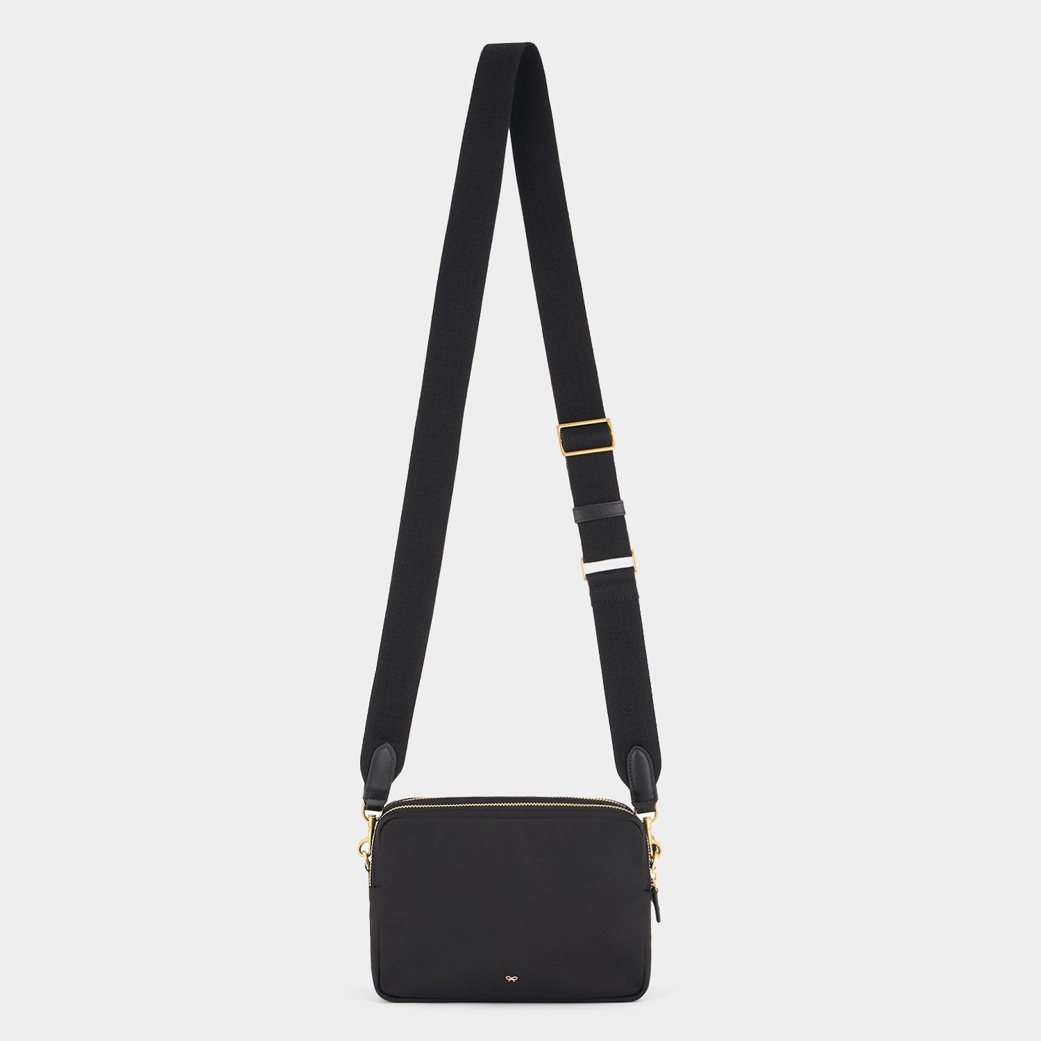 Trio Cross-body -

          
            Regenerated ECONYL® Nylon in Black -
          

          Anya Hindmarch US
