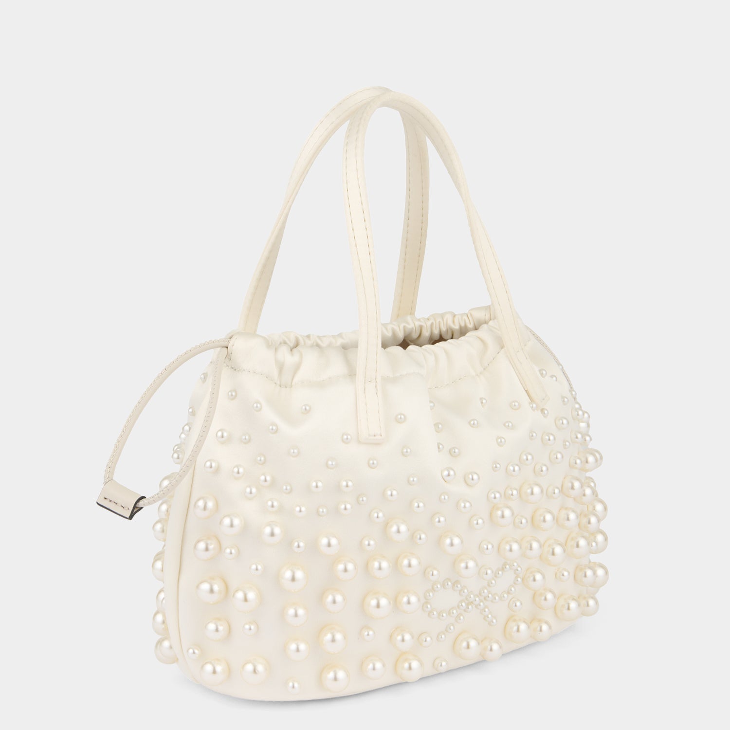 Pearls Drawstring Pouch -

          
            Satin/Suede Leather in Ivory -
          

          Anya Hindmarch US
