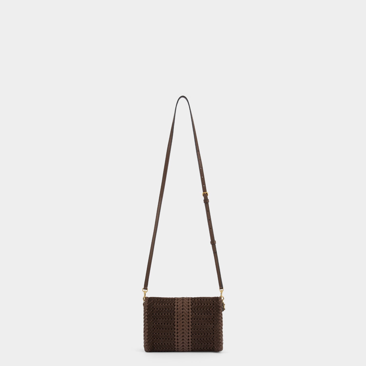 Neeson Cross-body -

          
            Suede Leather in Truffle -
          

          Anya Hindmarch US
