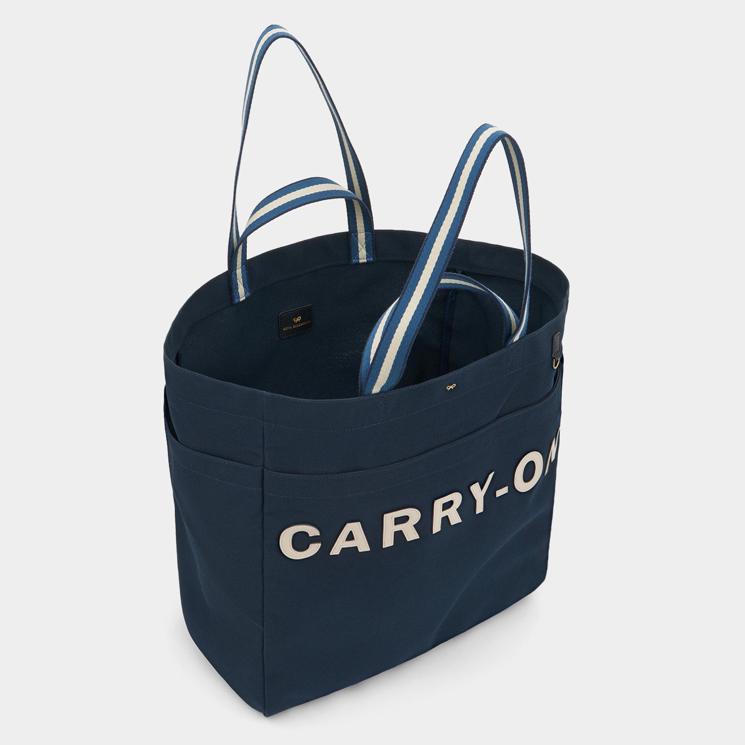 Carry-On Household Tote -

          
            Recycled Canvas in Marine -
          

          Anya Hindmarch US
