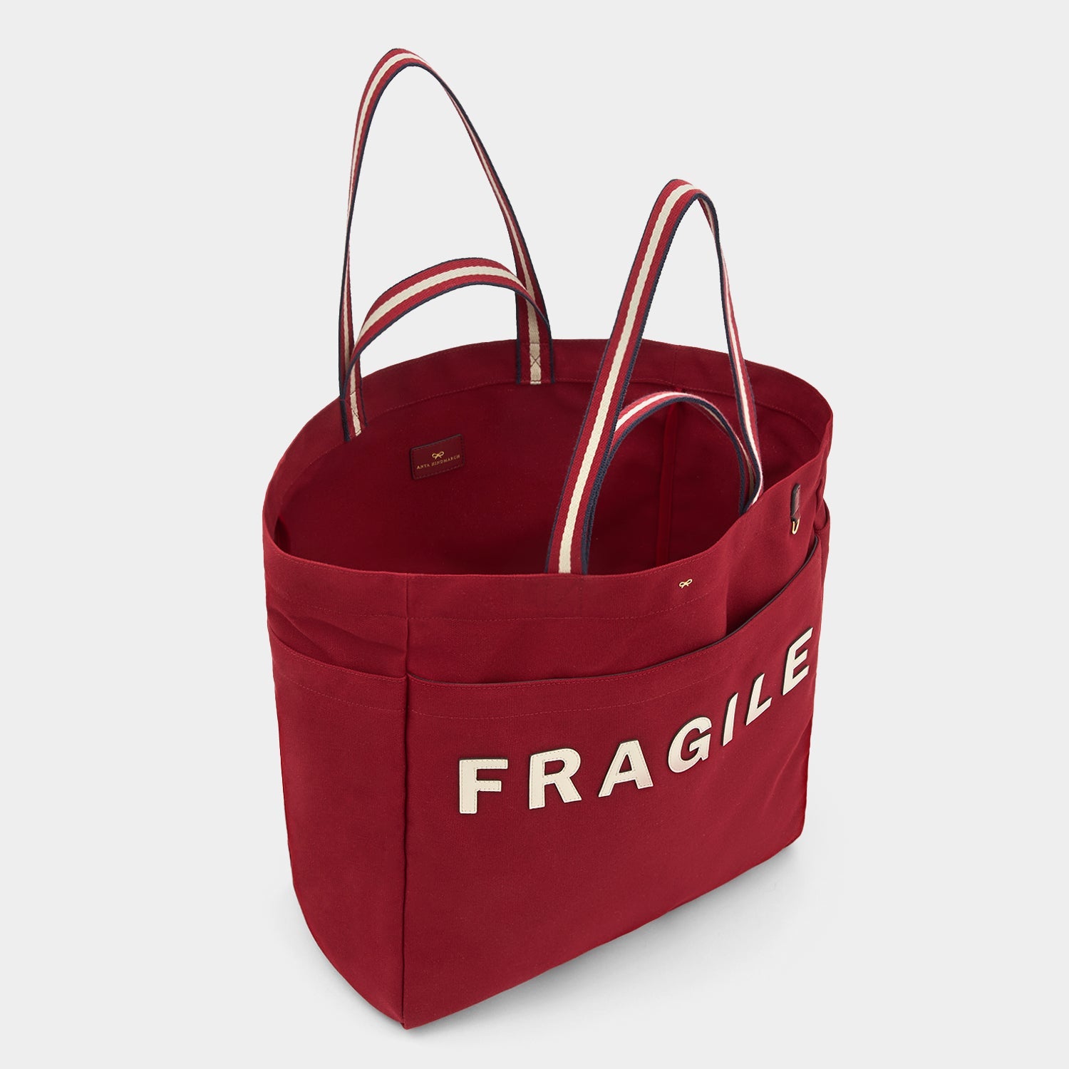 Fragile Household Tote -

          
            Recycled Canvas in Vampire -
          

          Anya Hindmarch US
