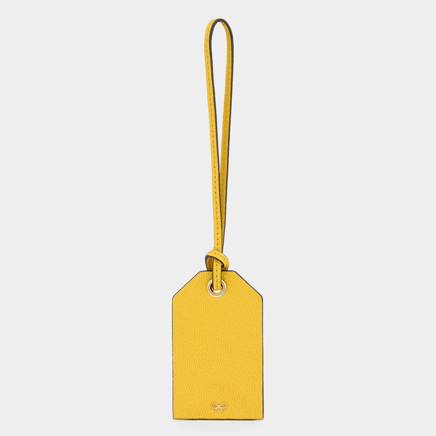 Caution Luggage Label Charm -

          
            Capra Leather in Yellow -
          

          Anya Hindmarch US
