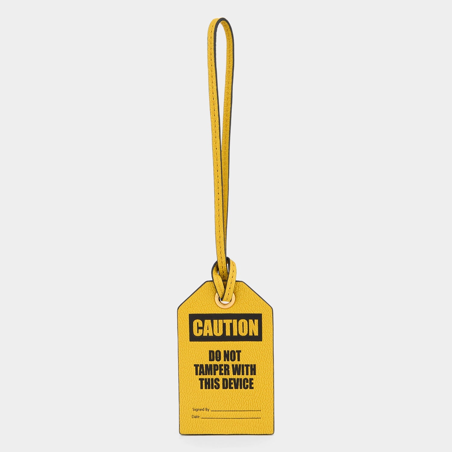 Caution Luggage Label Charm -

          
            Capra Leather in Yellow -
          

          Anya Hindmarch US
