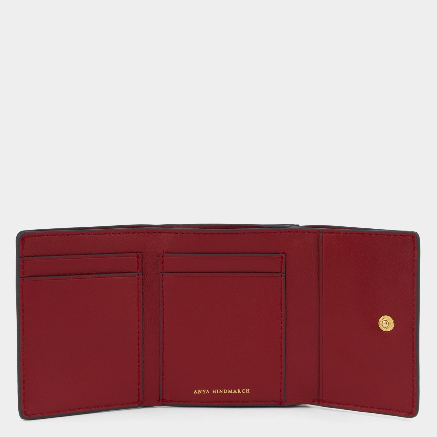 Snake Mini Trifold Wallet -

          
            Capra Leather in Grape -
          

          Anya Hindmarch US
