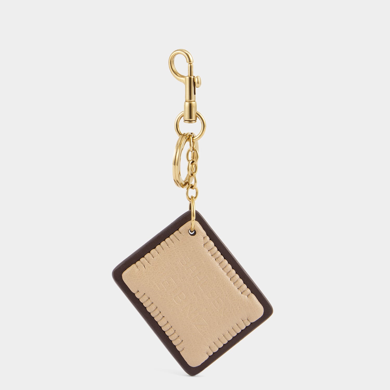 Anya Brands Choco Leibniz Charm -

          
            Capra Leather in Chocolate -
          

          Anya Hindmarch US
