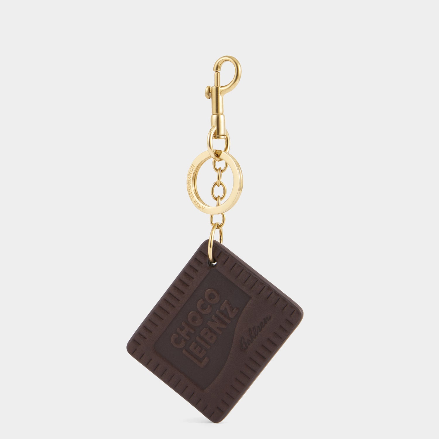 Anya Brands Choco Leibniz Charm -

          
            Capra Leather in Chocolate -
          

          Anya Hindmarch US
