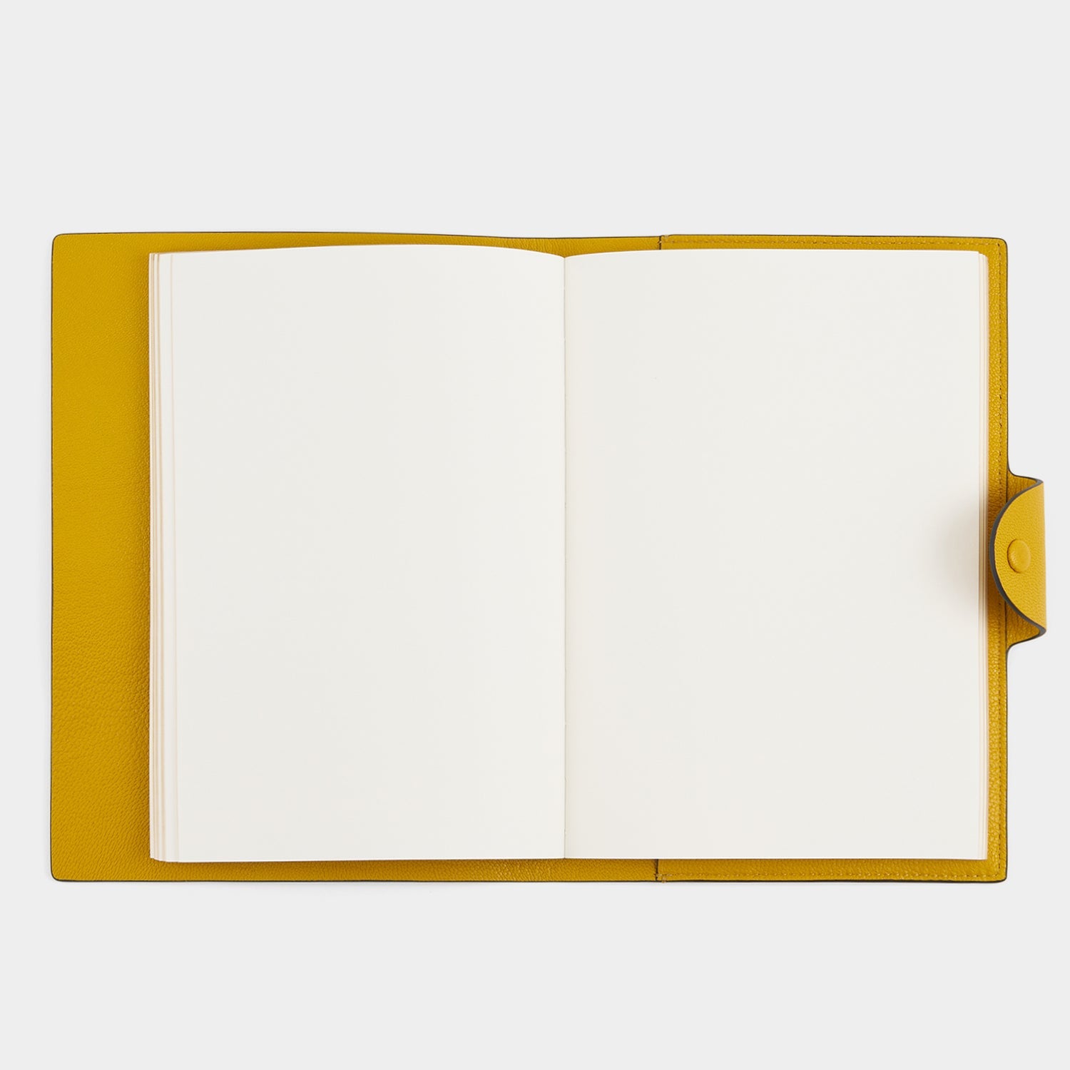 Wink A5 Journal -

          
            Capra Leather in Mustard Yellow -
          

          Anya Hindmarch US
