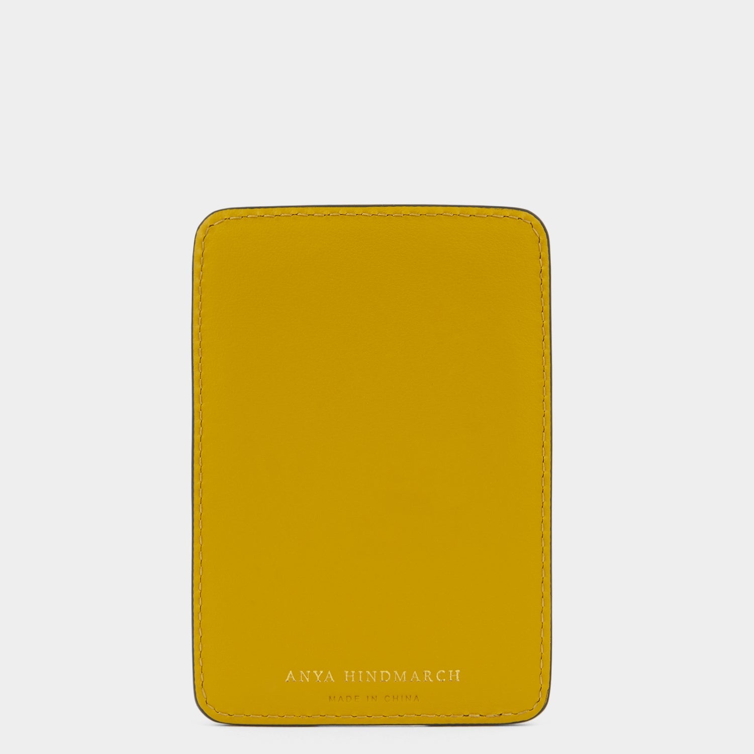 Wink MagSafe Card Case -

          
            Capra Leather in Mustard Yellow -
          

          Anya Hindmarch US
