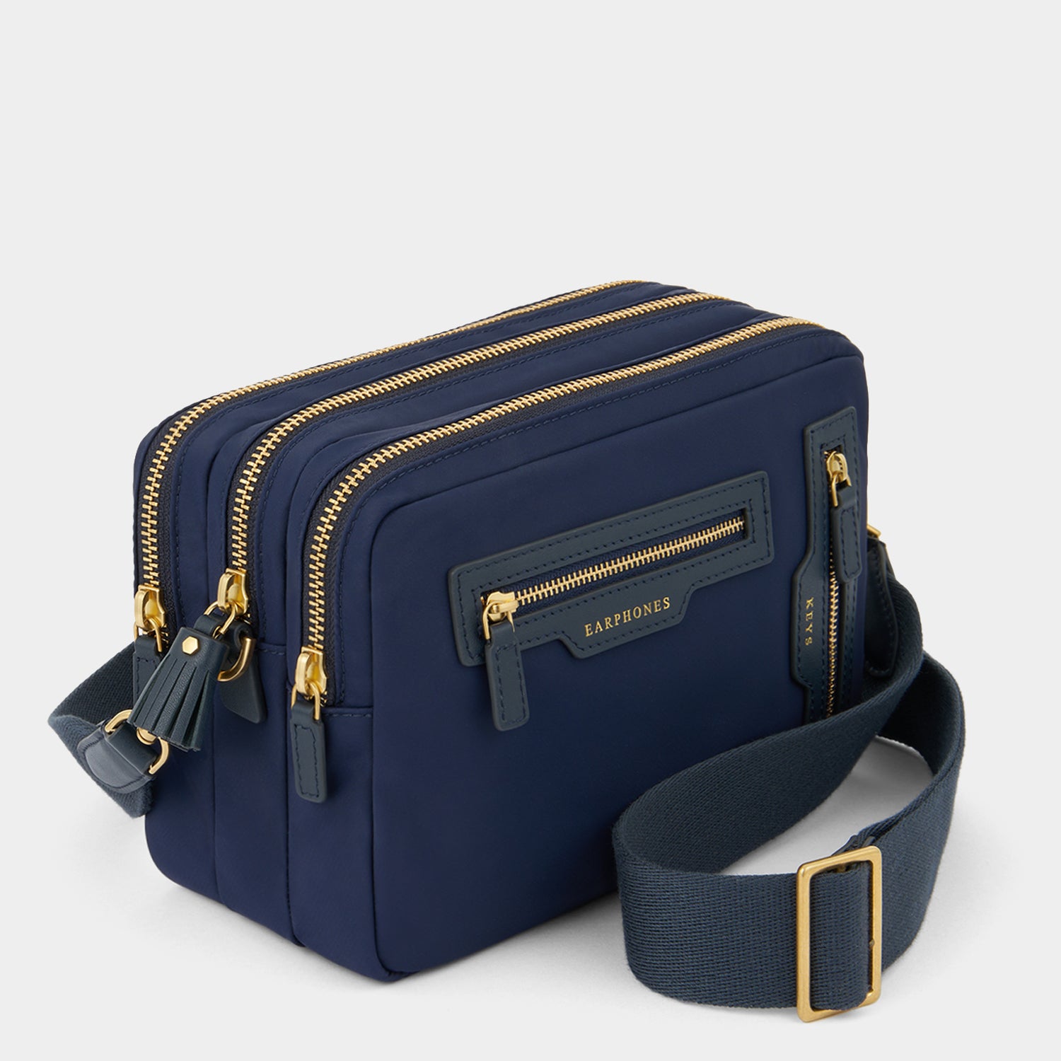 Trio Cross-body -

          
            Regenerated ECONYL® Nylon in Marine -
          

          Anya Hindmarch US
