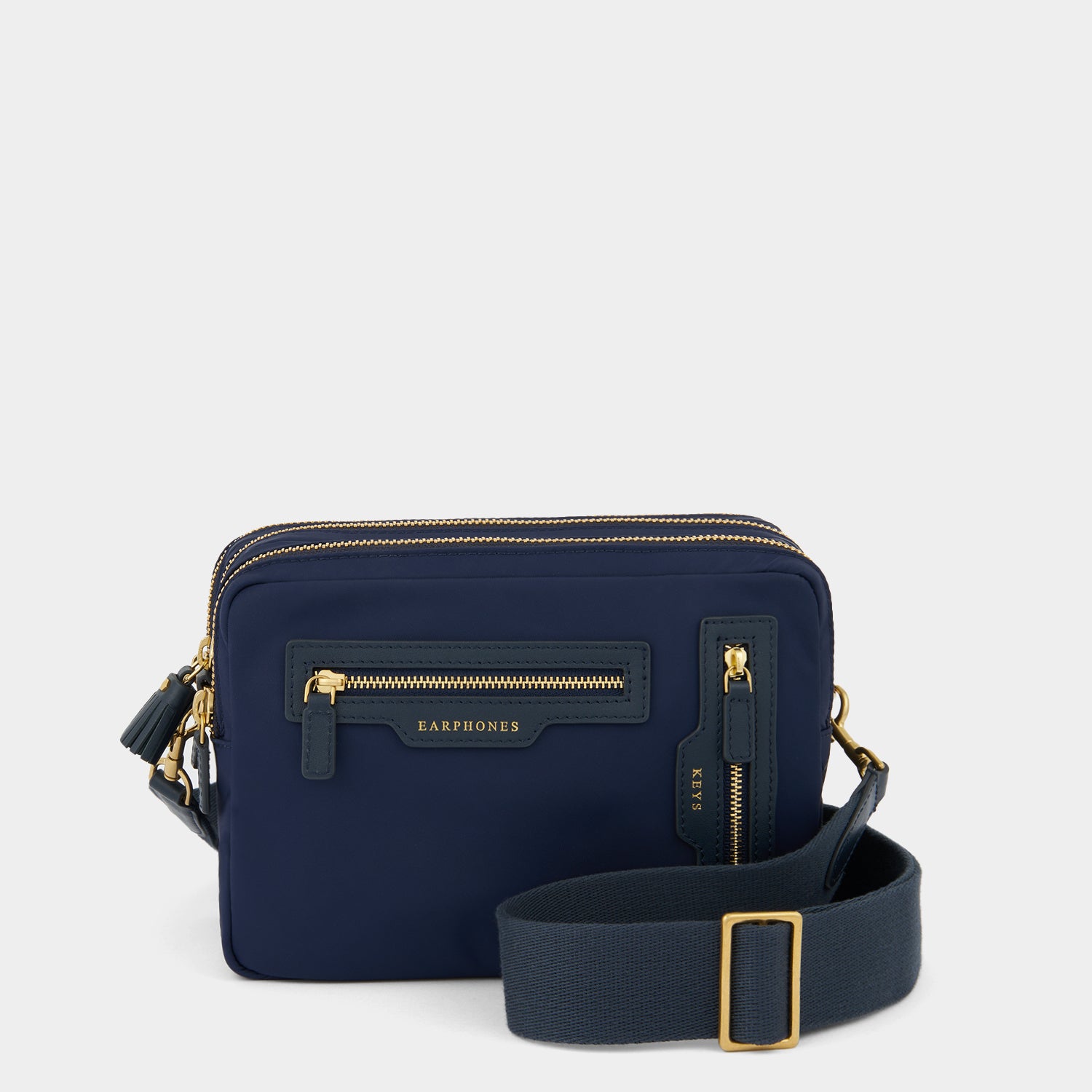 Trio Cross-body -

          
            Regenerated ECONYL® Nylon in Marine -
          

          Anya Hindmarch US
