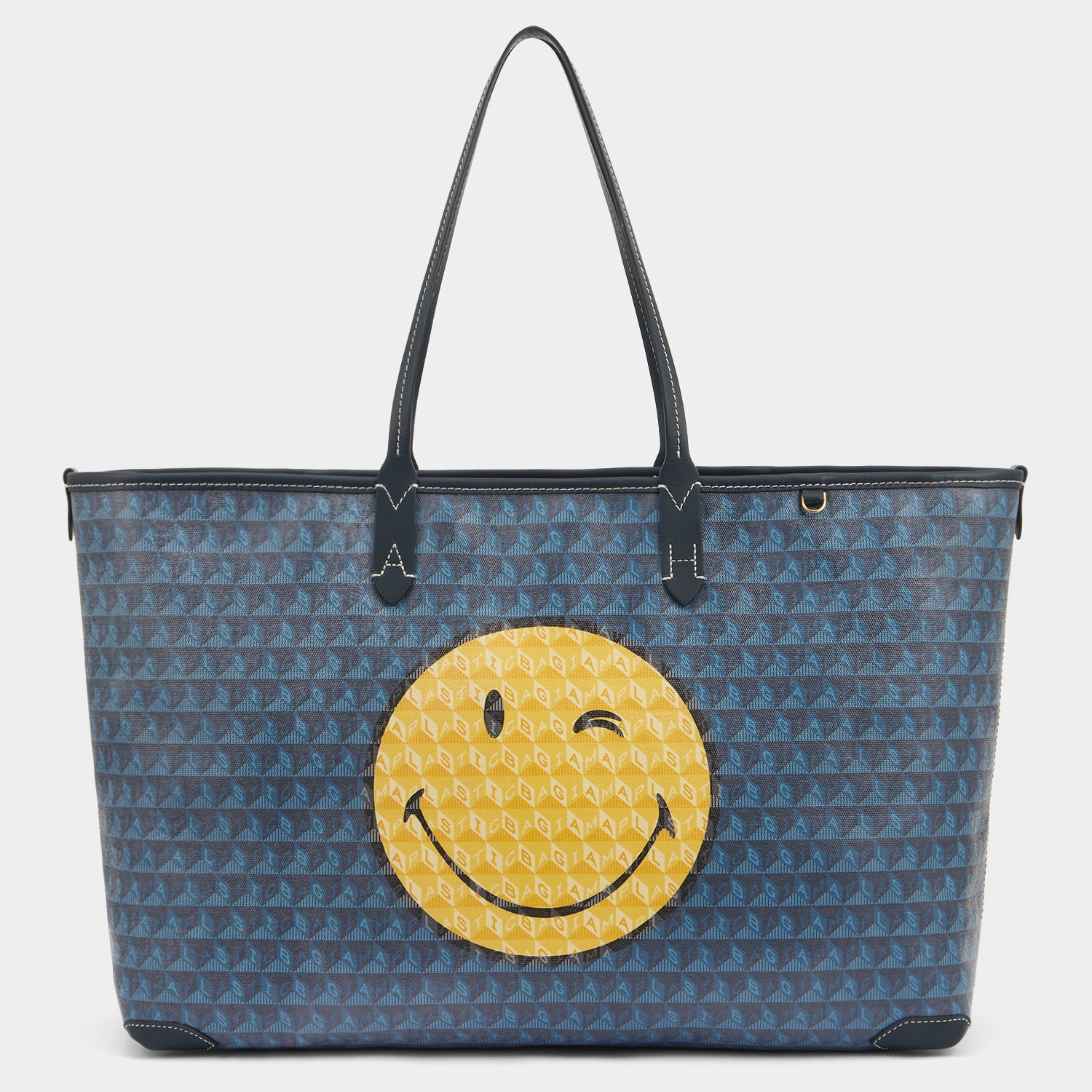 I am a Plastic Bag Wink Zipped Tote -

          
            Recycled Canvas in Marine -
          

          Anya Hindmarch US
