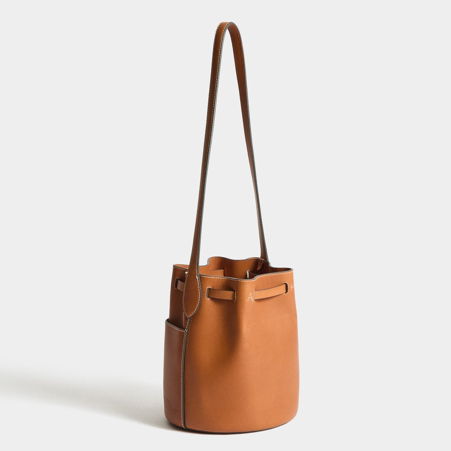 Return To Nature Small Bucket Bag -

          
            Natural Grain Leather in Pecan Brown -
          

          Anya Hindmarch US
