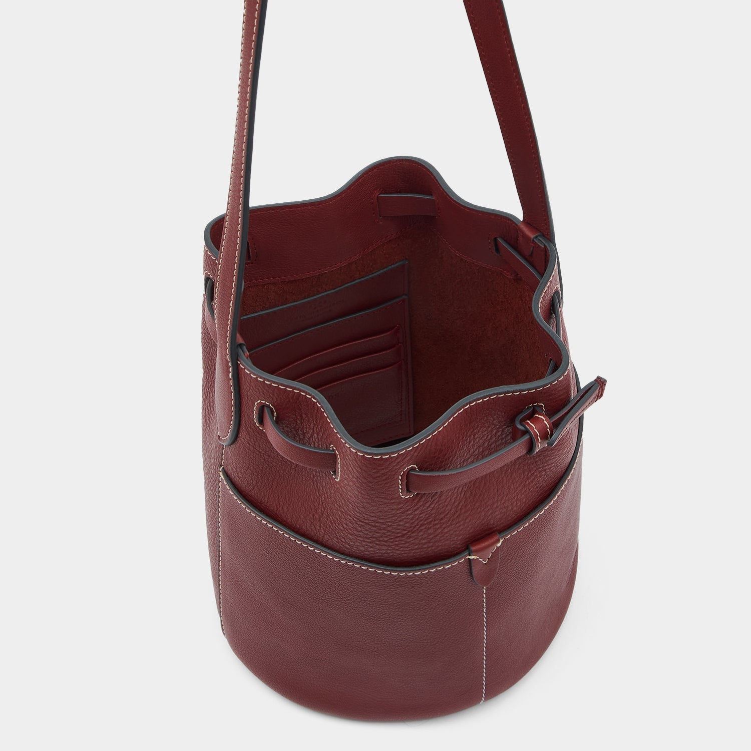 Return to Nature Small Bucket Bag -

          
            Natural Grain Leather in Rosewood Red -
          

          Anya Hindmarch US
