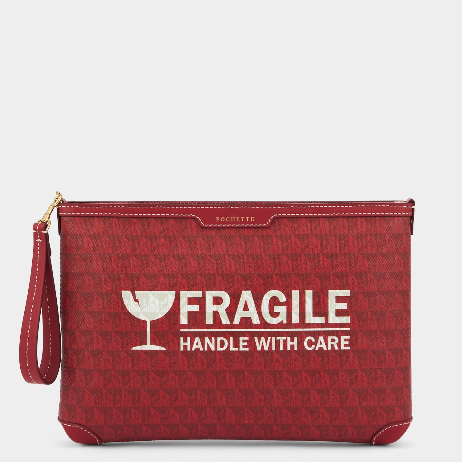 Fragile I am a Plastic Bag Pochette -

          
            Recycled Canvas in Vampire -
          

          Anya Hindmarch US
