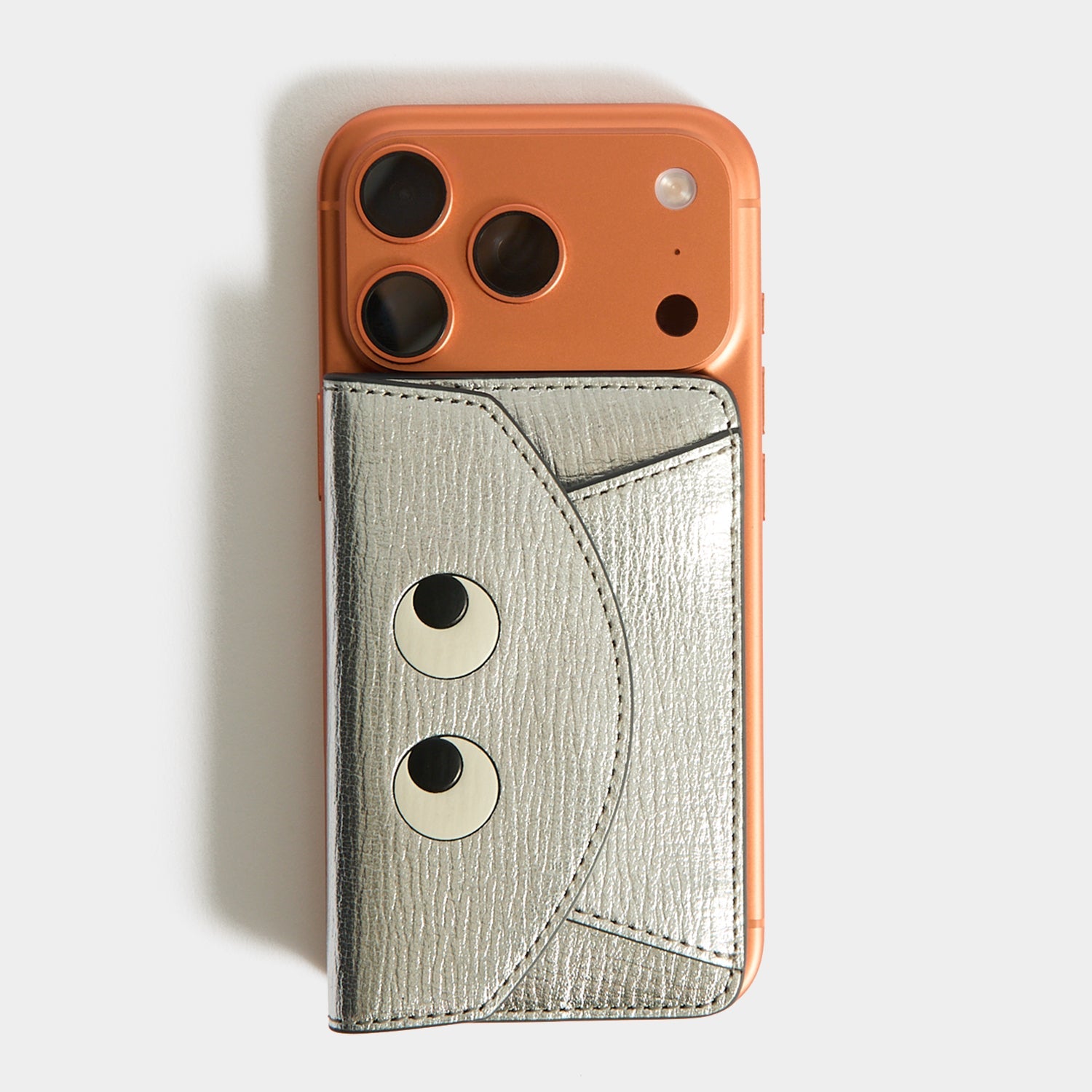 Eyes MagSafe Envelope Card Case -

          
            Capra Leather in Silver -
          

          Anya Hindmarch US
