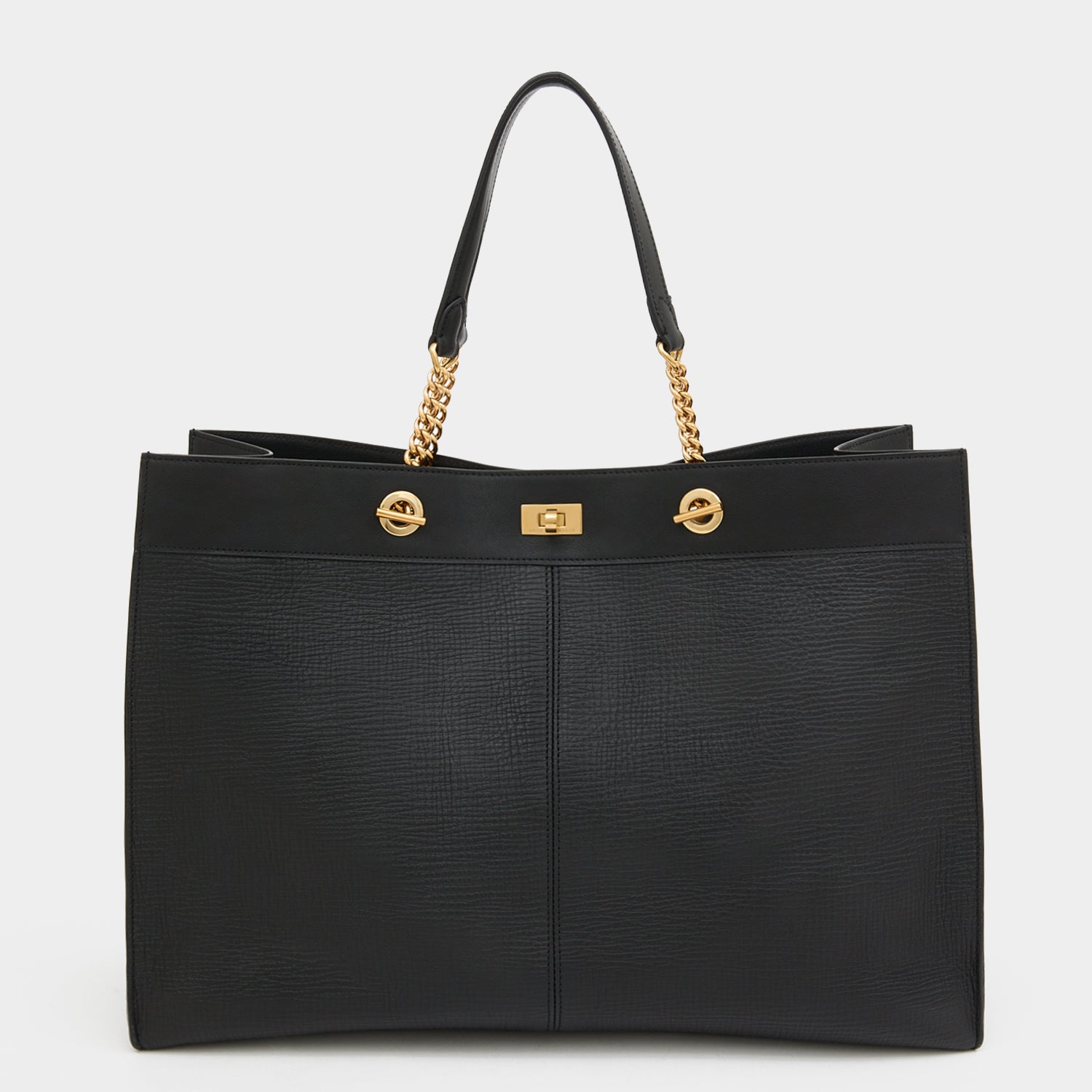 Mortimer Eyelet Tote -

          
            Crosshatch Leather in Black -
          

          Anya Hindmarch US
