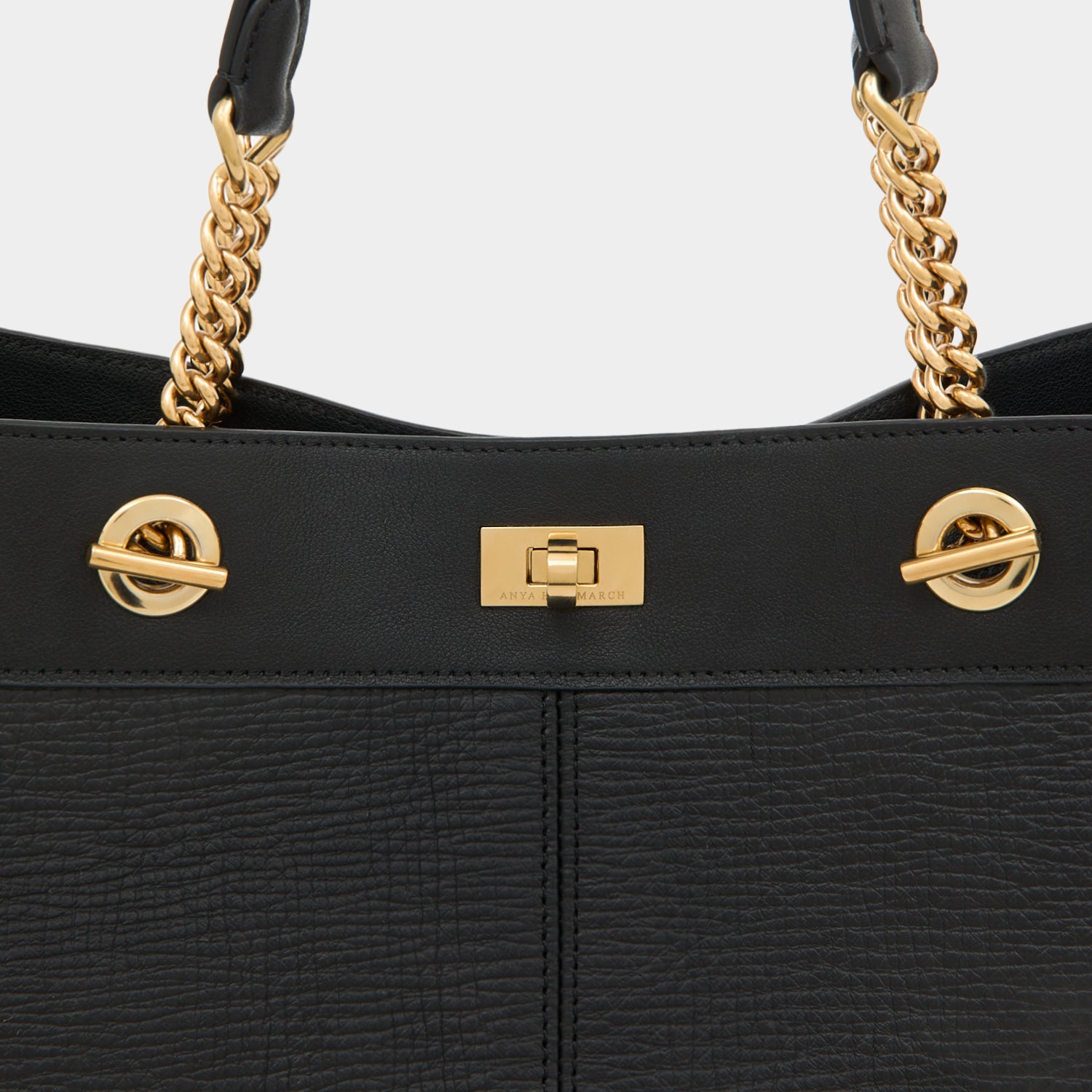 Mortimer Eyelet Tote -

          
            Crosshatch Leather in Black -
          

          Anya Hindmarch US
