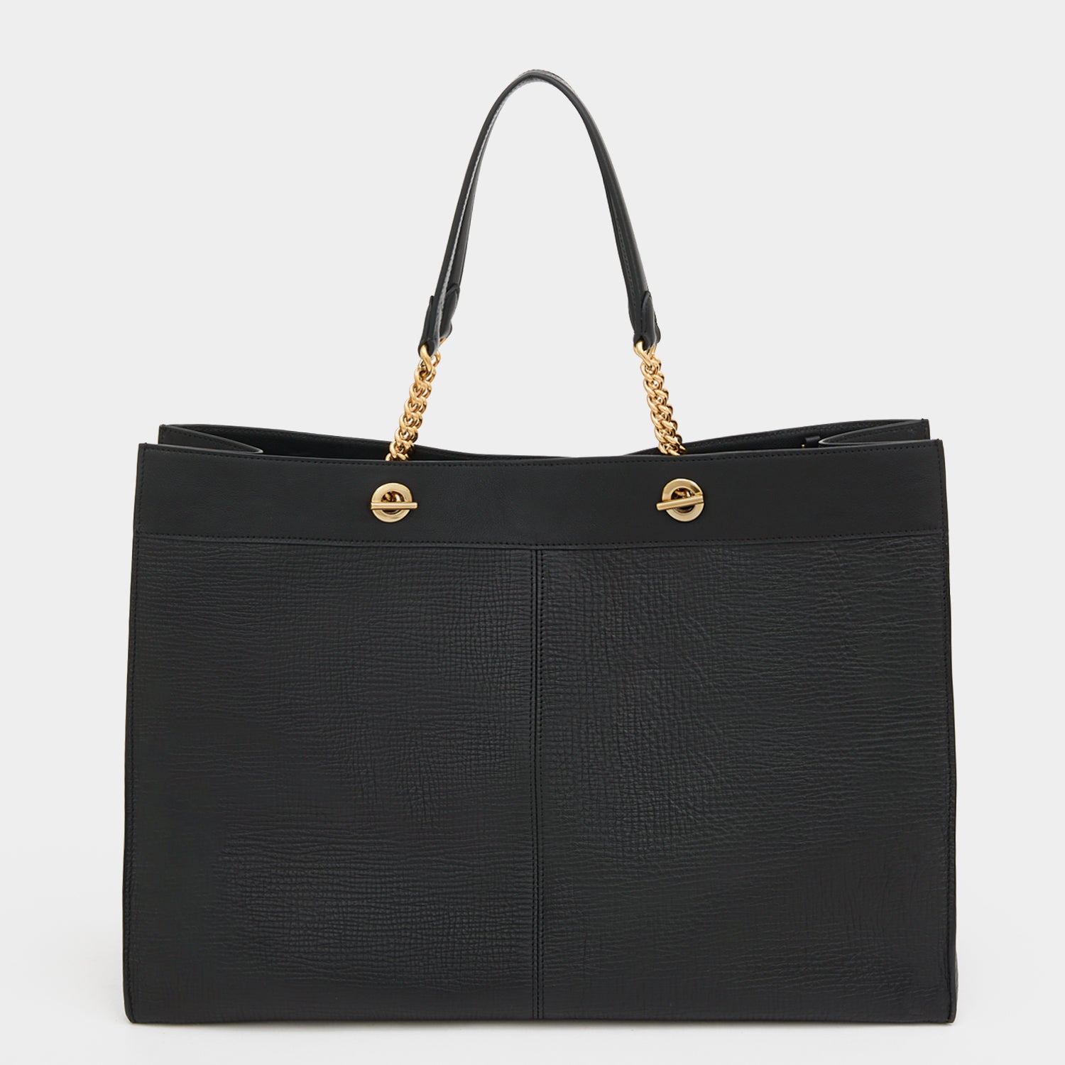 Mortimer Eyelet Tote -

          
            Crosshatch Leather in Black -
          

          Anya Hindmarch US
