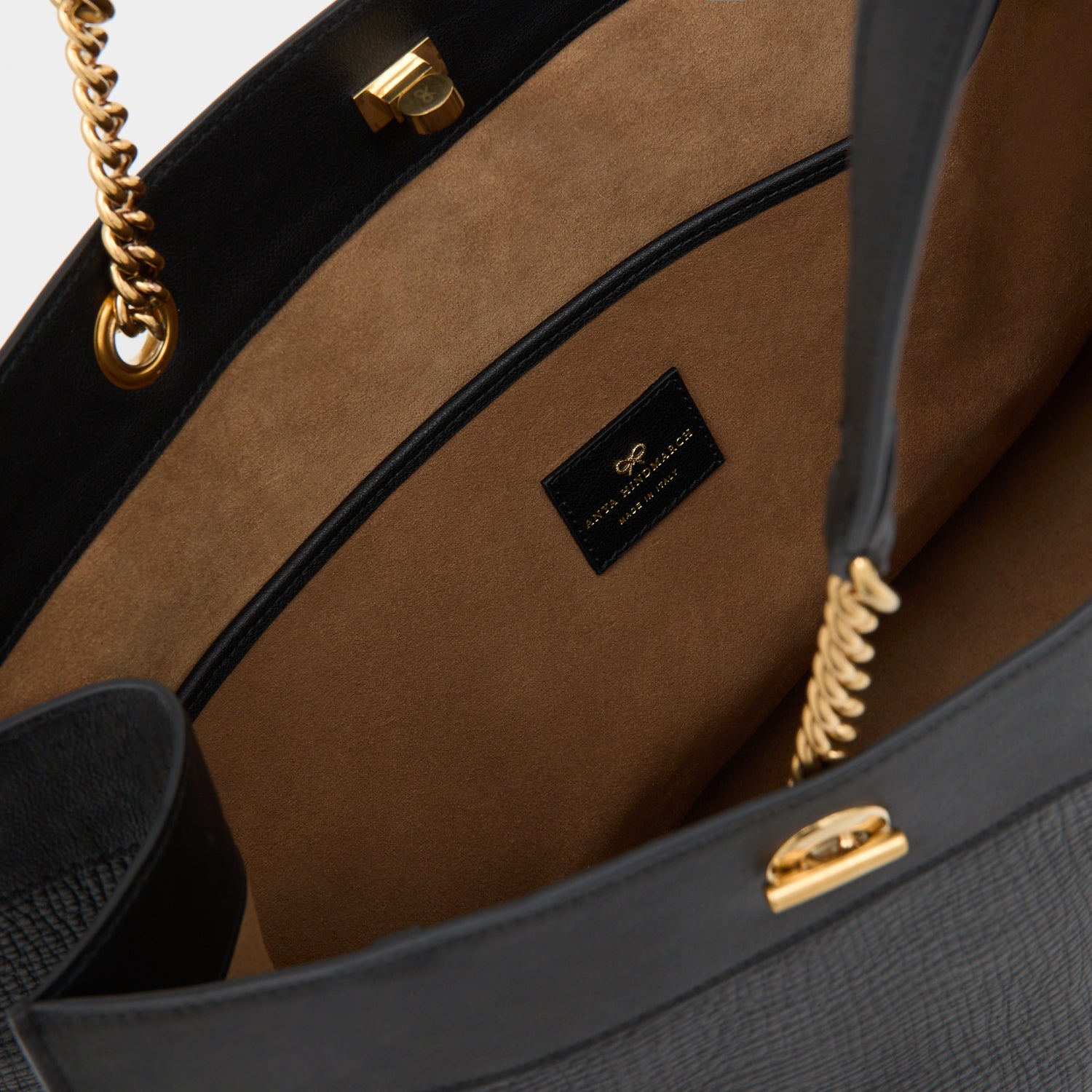 Mortimer Eyelet Tote -

          
            Crosshatch Leather in Black -
          

          Anya Hindmarch US
