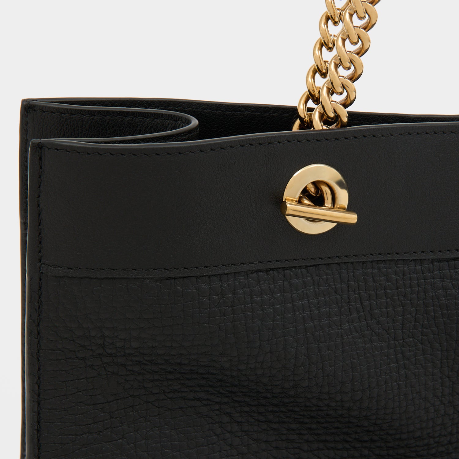 Mortimer Small Eyelet Tote -

          
            Crosshatch Leather in Black -
          

          Anya Hindmarch US
