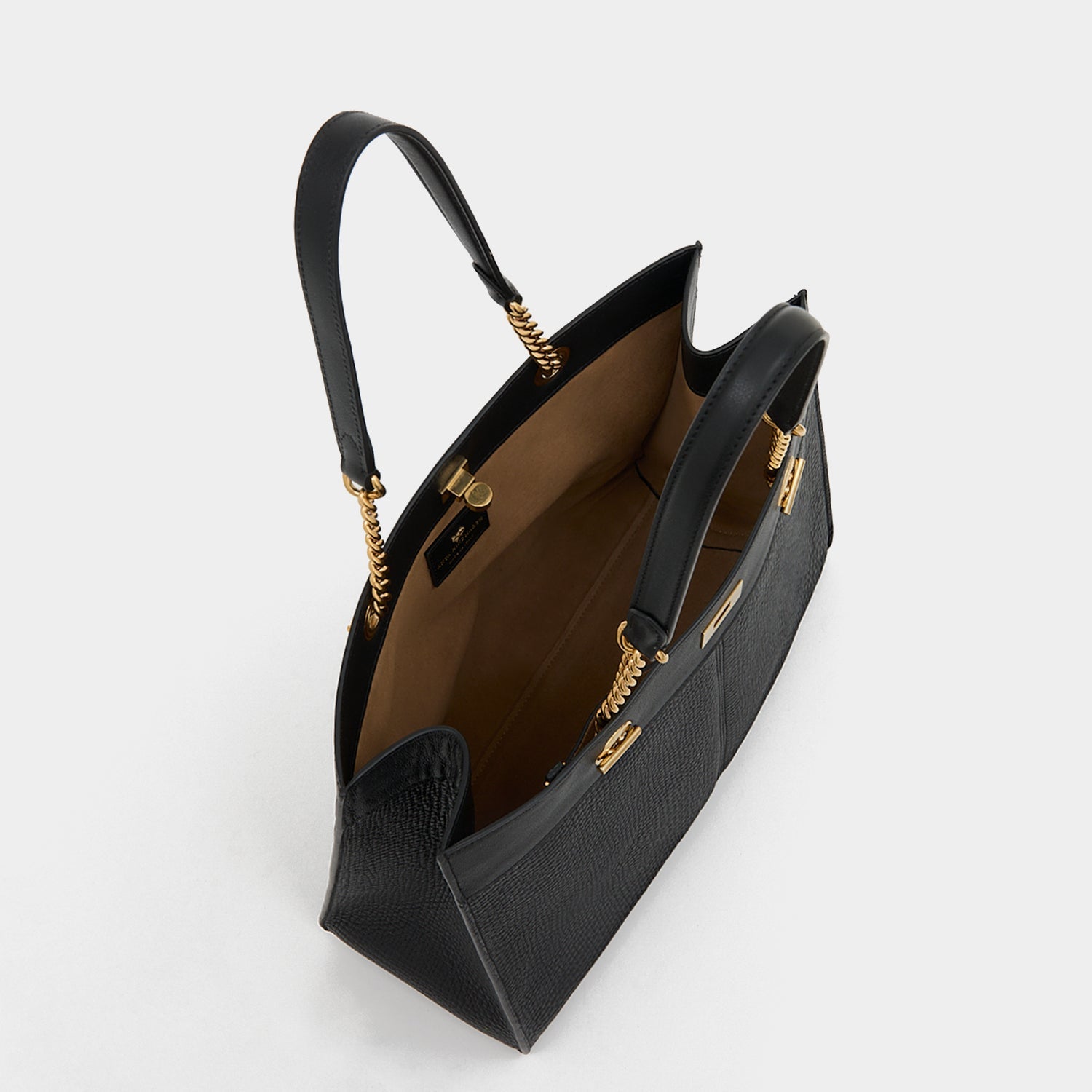 Mortimer Small Eyelet Tote -

          
            Crosshatch Leather in Black -
          

          Anya Hindmarch US
