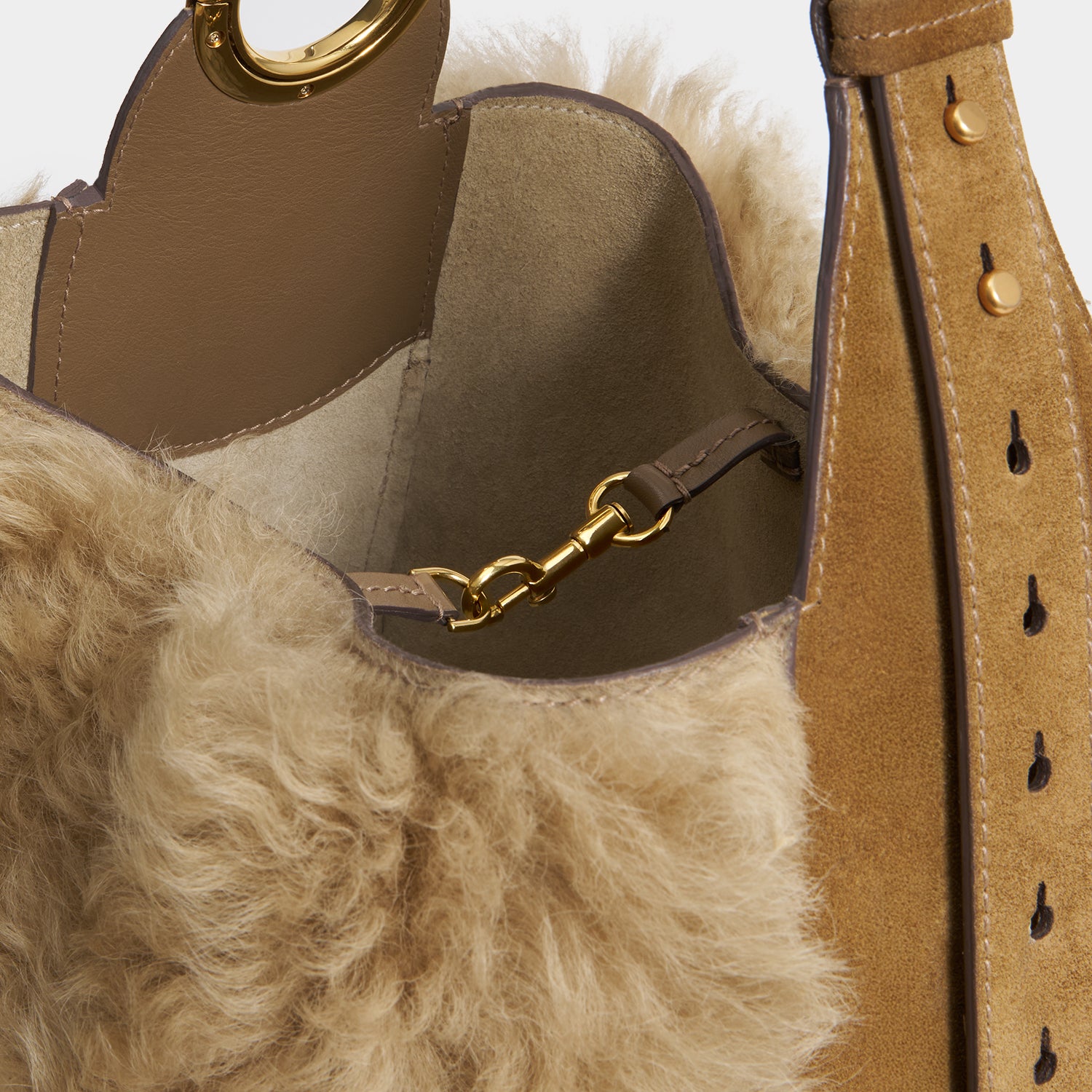 Ringo Shearling Shoulder Bag -

          
            Shearling in Taupe -
          

          Anya Hindmarch US
