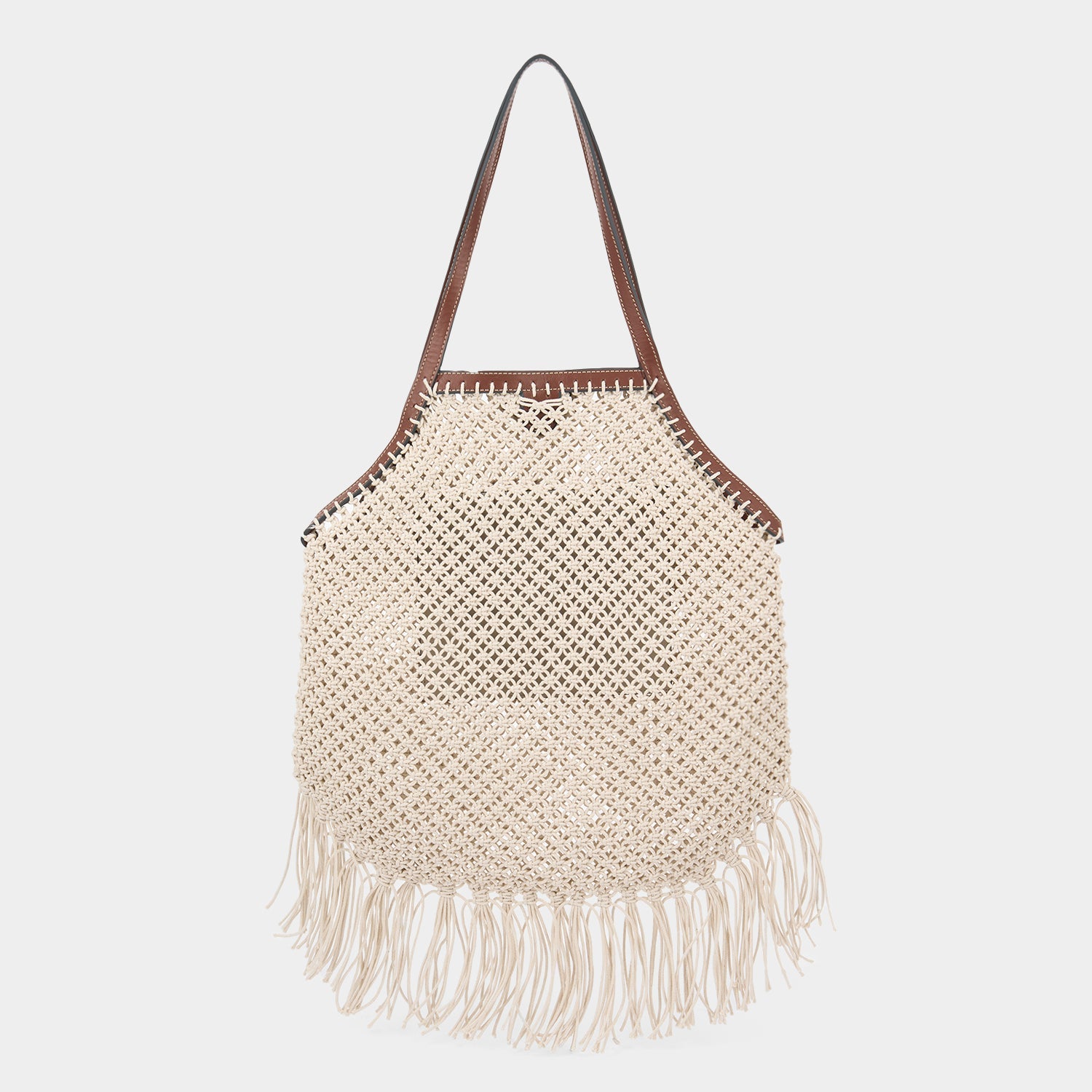 Macramé tote bag handcrafted from natural cotton cord and embroidered Eyes motif with eco-leather top handles and detachable long crossbody strap by Anya Hindmarch