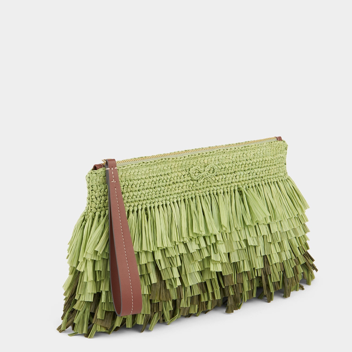 Green raffia clutch bag by Anya Hindmarch