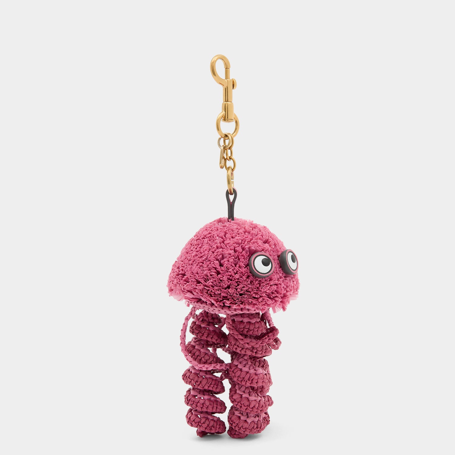 Pink jellyfish charm made of raffia by Anya Hindmarch