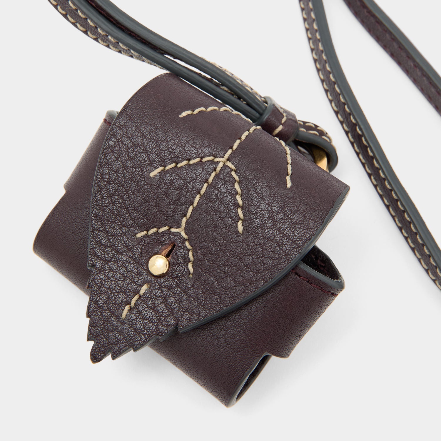 RTN Earphone Case -

          
            Natural Grain Leather in Grape -
          

          Anya Hindmarch US
