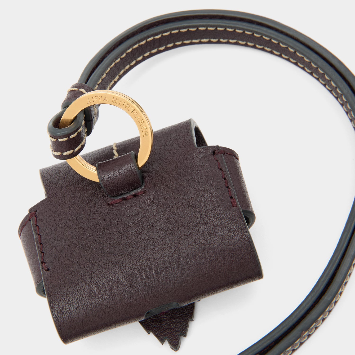 RTN Earphone Case -

          
            Natural Grain Leather in Grape -
          

          Anya Hindmarch US
