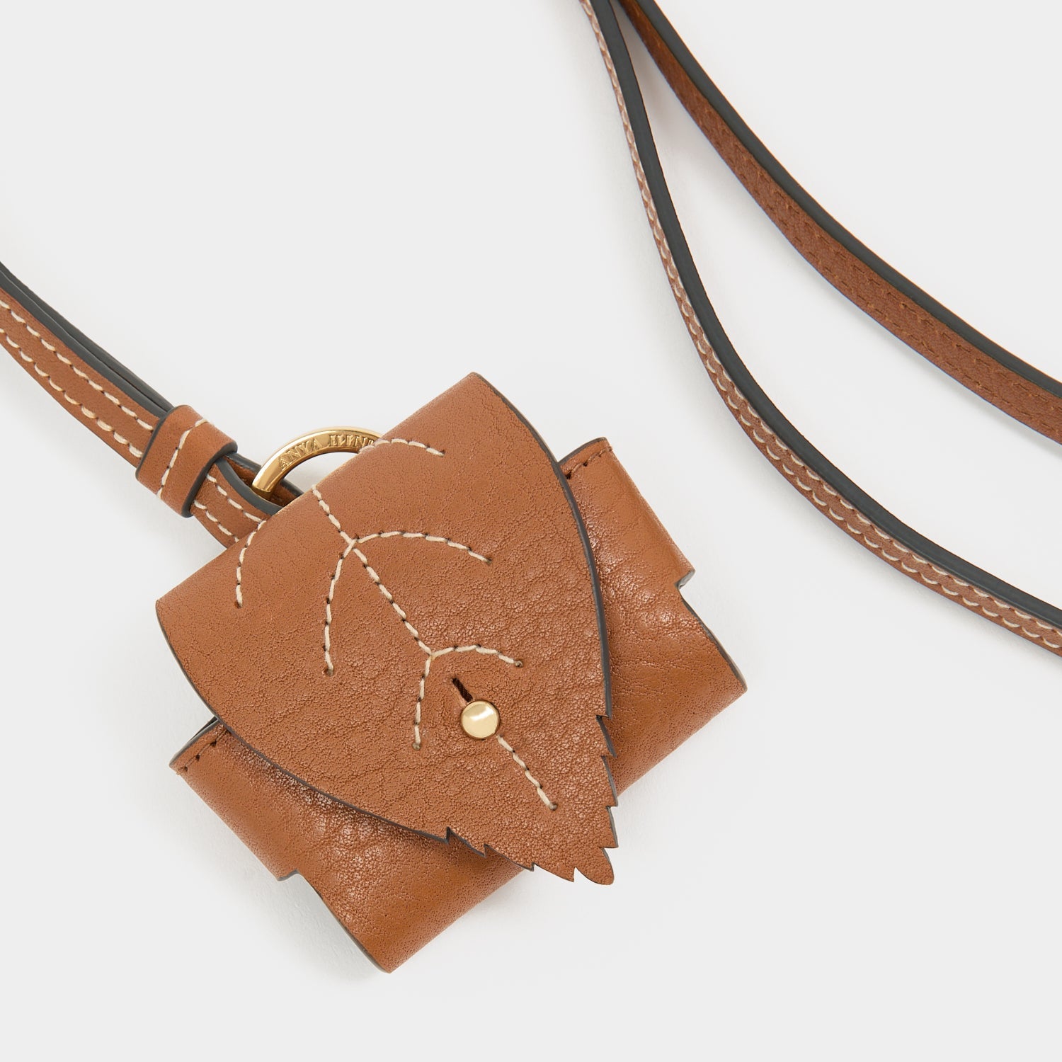 RTN Earphone Case -

          
            Natural Grain Leather in Pecan -
          

          Anya Hindmarch US

