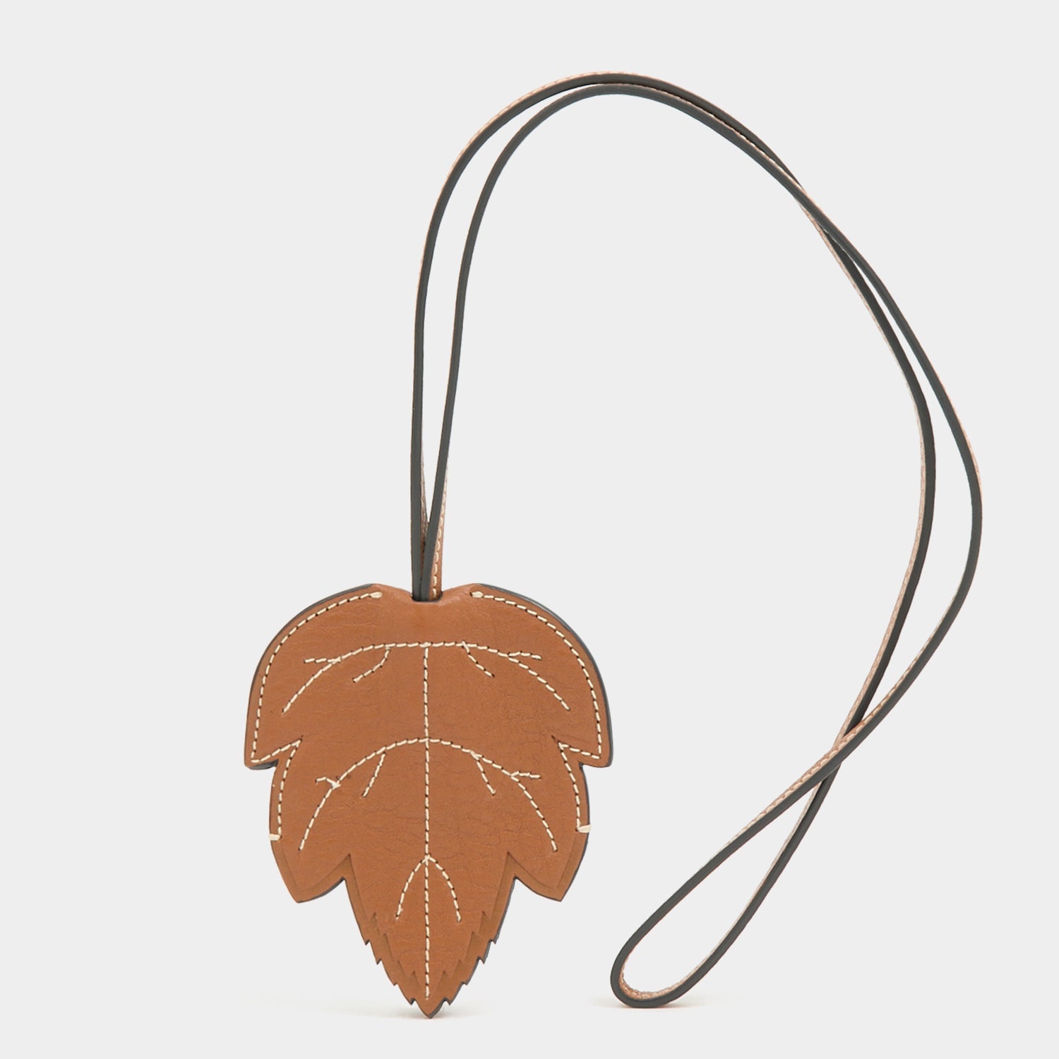 RTN Leaf Key Charm -

          
            Natural Grain Leather in Pecan -
          

          Anya Hindmarch US
