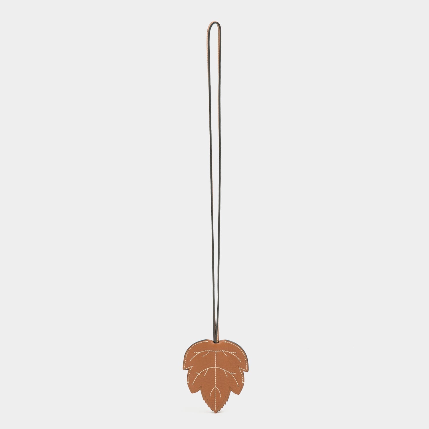 RTN Leaf Key Charm -

          
            Natural Grain Leather in Pecan -
          

          Anya Hindmarch US
