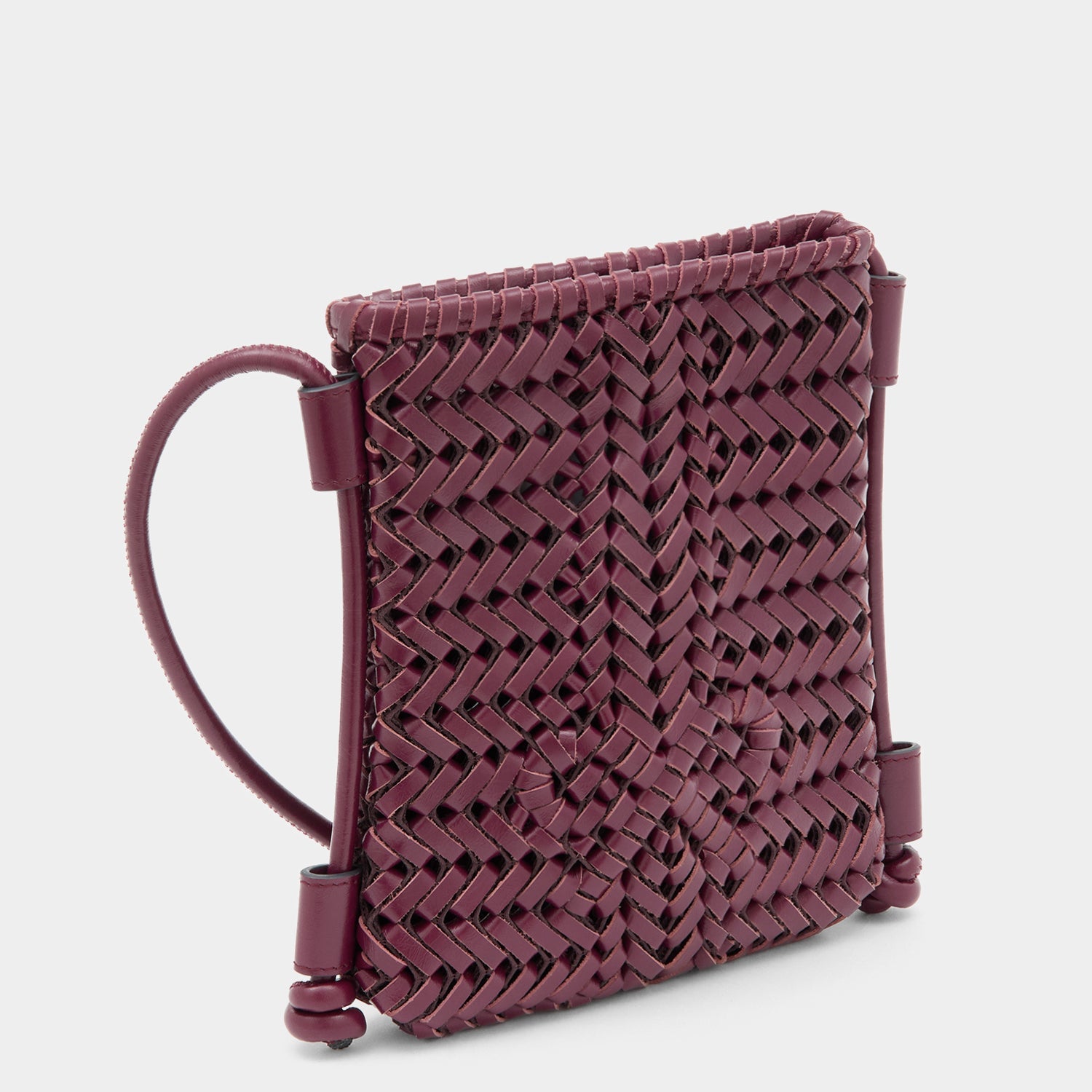 Neeson Cross-body Pouch -

          
            Calf Leather in Orchid Purple -
          

          Anya Hindmarch US
