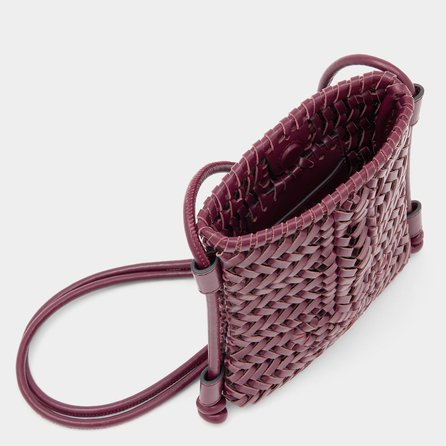 Neeson Cross-body Pouch -

          
            Calf Leather in Orchid Purple -
          

          Anya Hindmarch US
