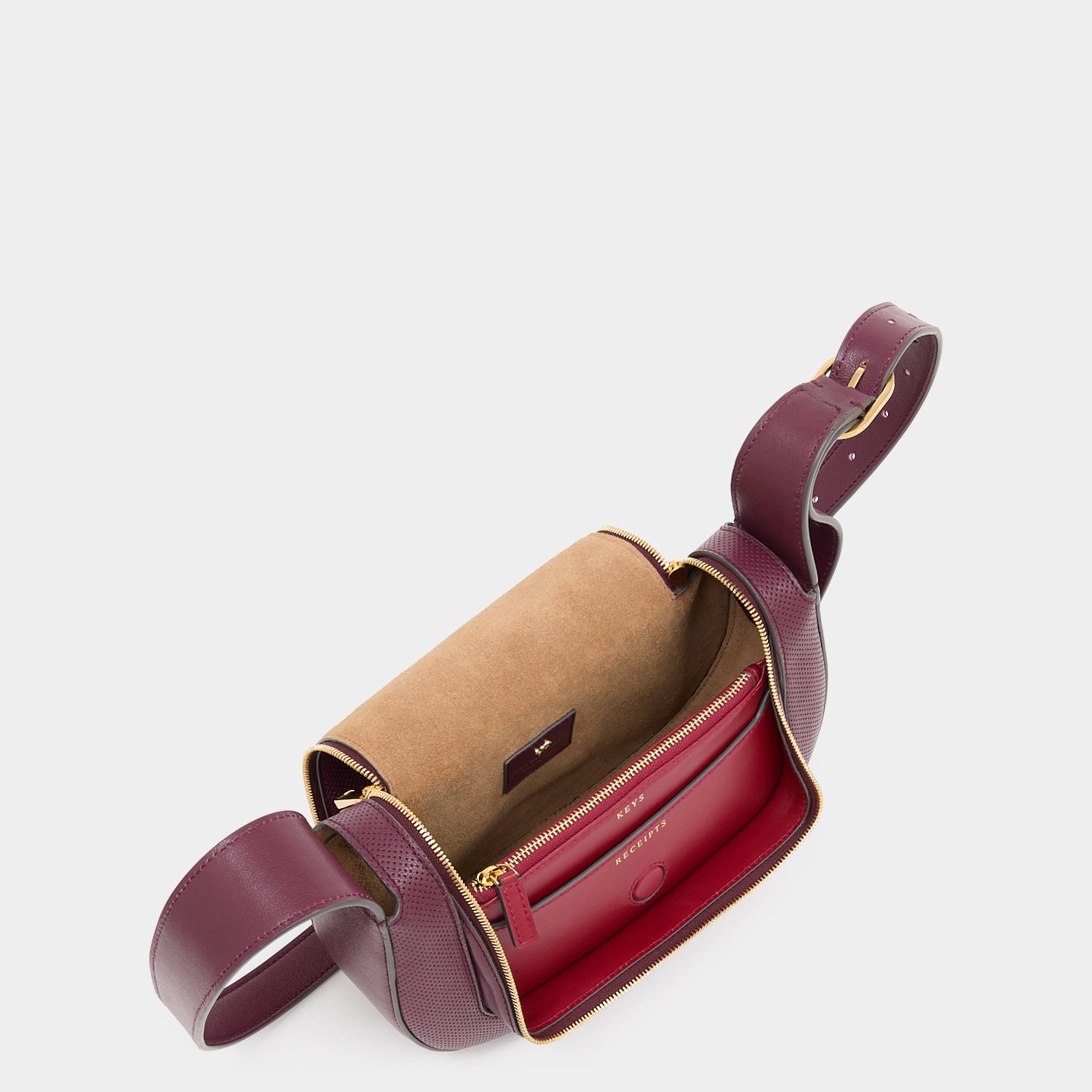 Vere Perforated Small Cross-body -

          
            Perforated Leather in Orchid Purple -
          

          Anya Hindmarch US
