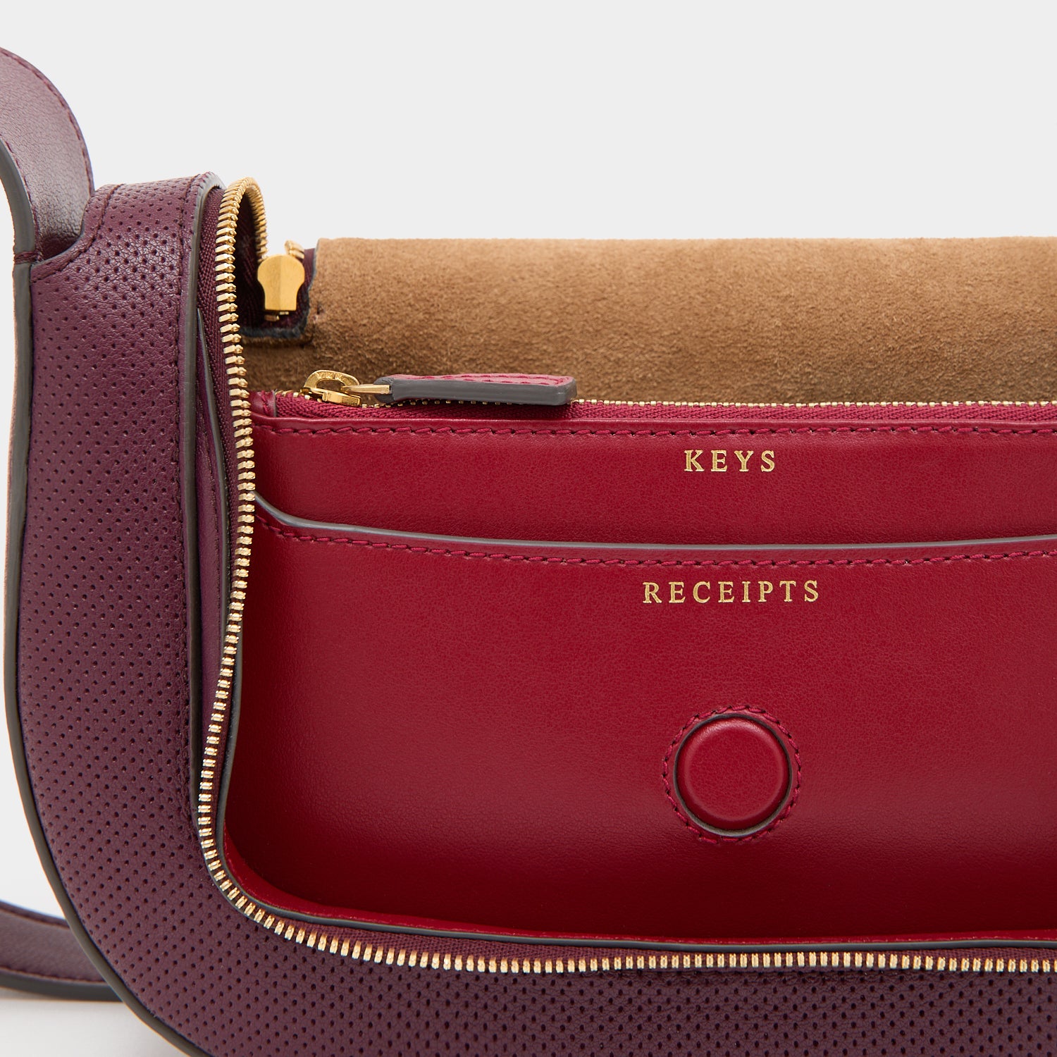 Vere Perforated Small Cross-body -

          
            Perforated Leather in Orchid Purple -
          

          Anya Hindmarch US

