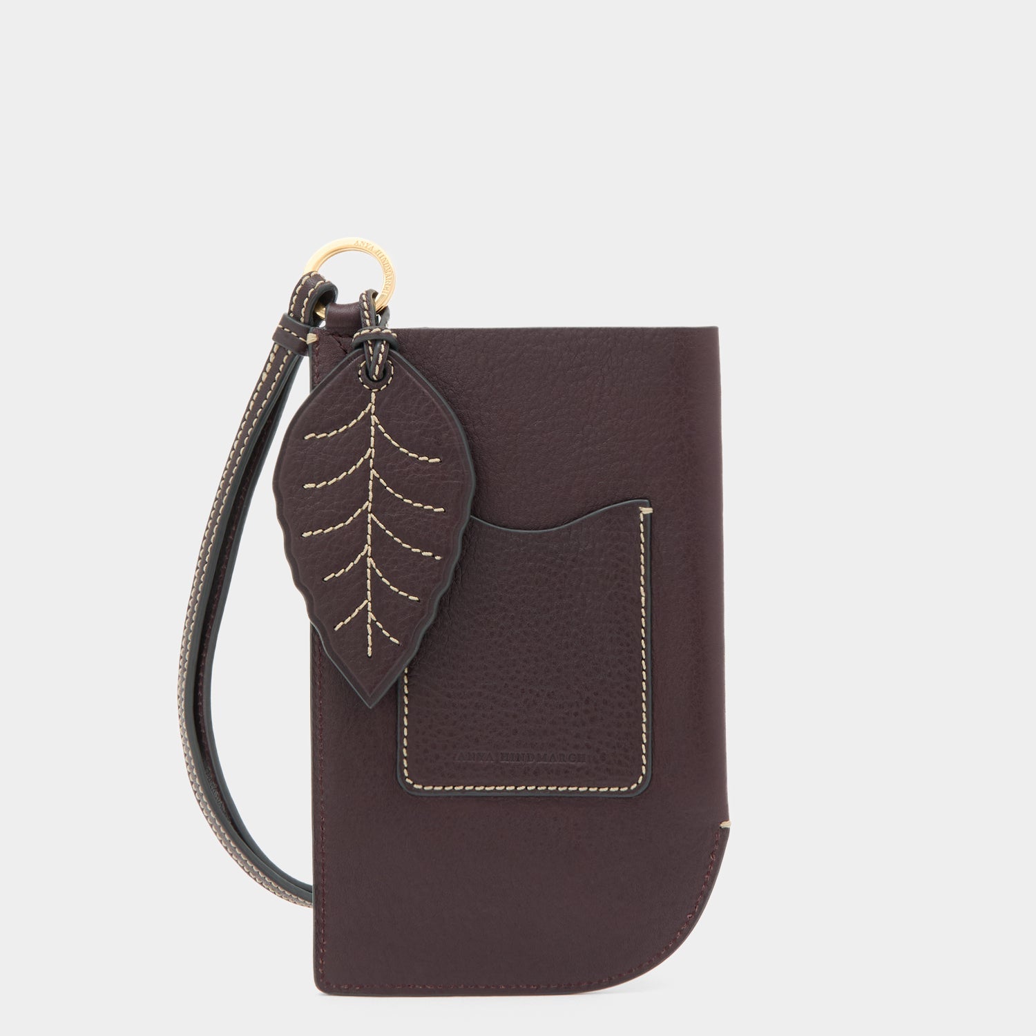 RTN Strap Phone Pouch -

          
            Natural Grain Leather in Grape Purple -
          

          Anya Hindmarch US
