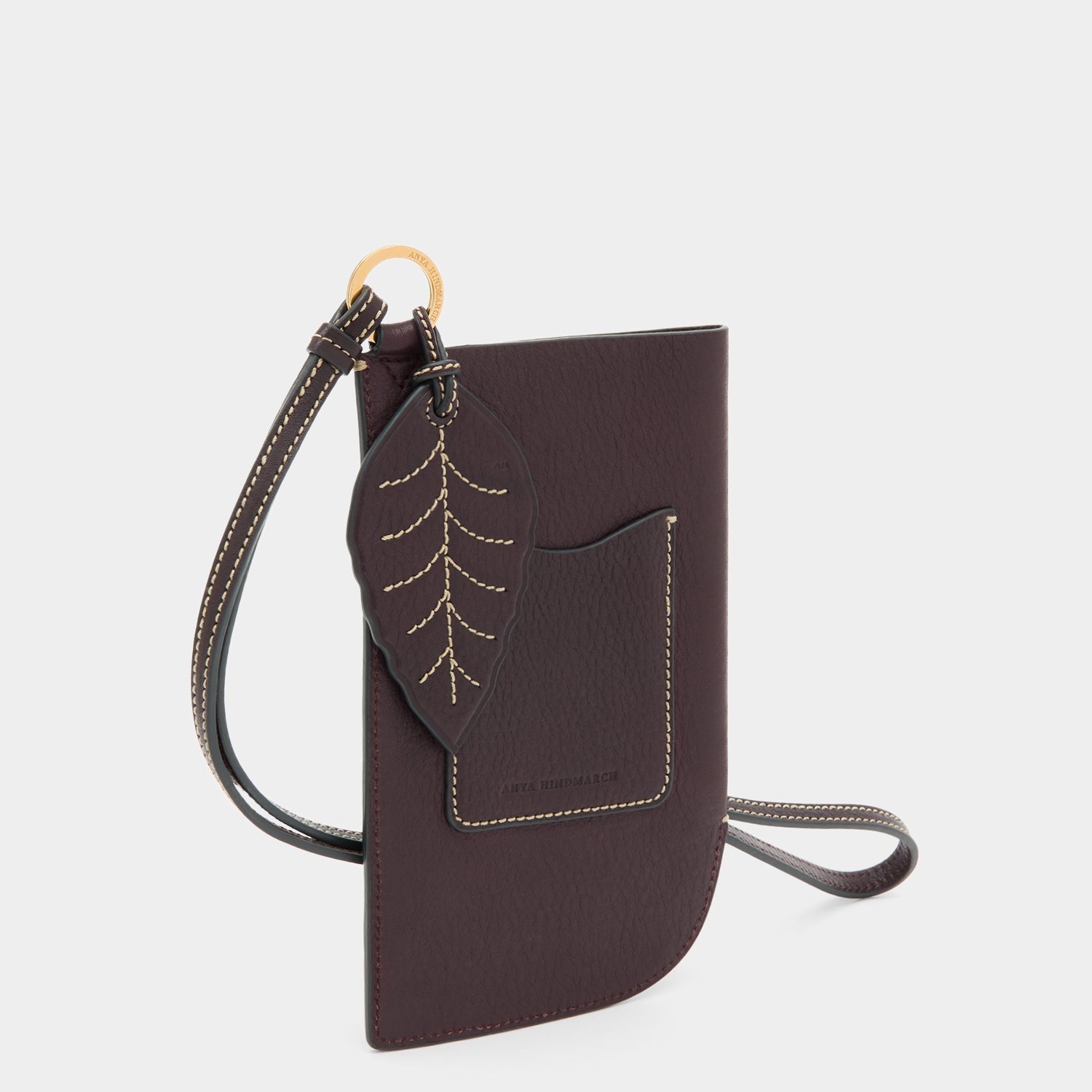 RTN Strap Phone Pouch -

          
            Natural Grain Leather in Grape Purple -
          

          Anya Hindmarch US
